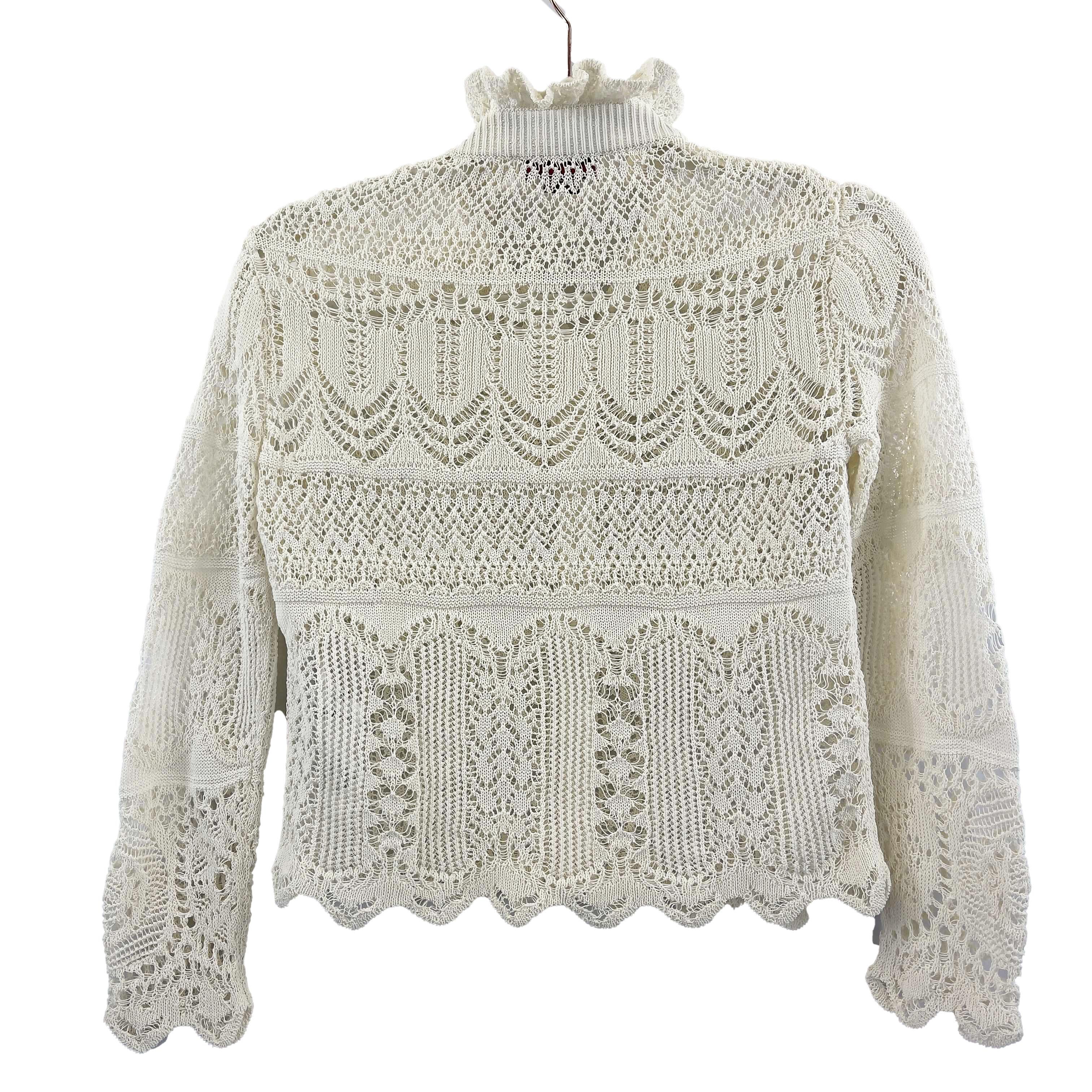 Alexander McQueen - Ivory Lace Knit Pointelle Cardigan Sweater - Size XS

Description

This cotton blend open weave sweater is from Alexander McQueen's 2020 collection and features a scalloped edge wrist and waist hem, high ruffled neck, long