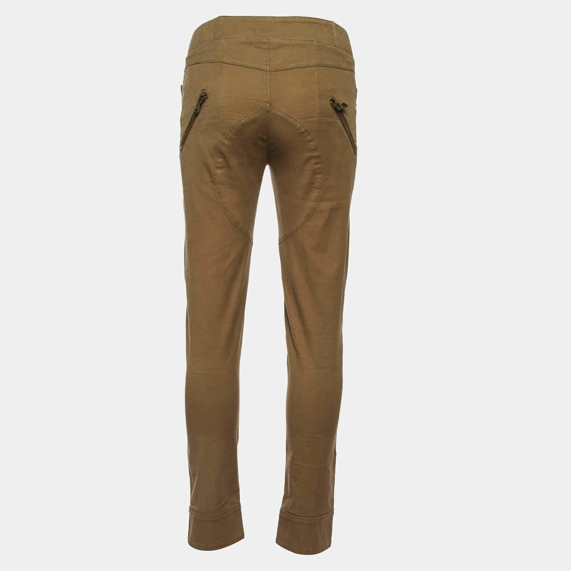 Ce pantalon est à la fois élégant et chic. Fabriqué à partir de tissus de qualité et doté d'une coupe parfaite, ce pantalon s'accompagne d'un haut chic.