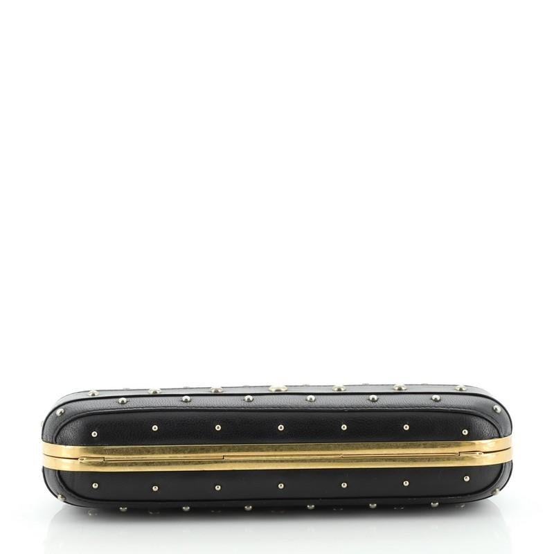 purse with brass knuckles