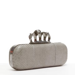 ALEXANDER MCQUEEN Knuckle Duster scaled leather crystal skull 4 ring box clutch