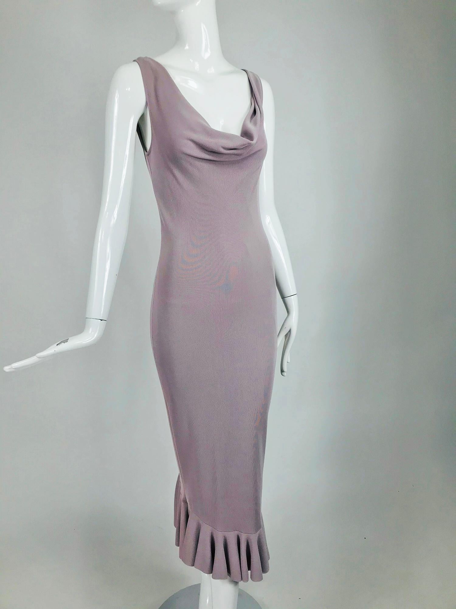 Alexander McQueen lavender knit jersey dress with black ribbon ties at the back. Sleeveless draped cowl neck dress is fitted through the body and falls to a bias cut hem. The dress has a very low back, it closes at the upper and mid back with two