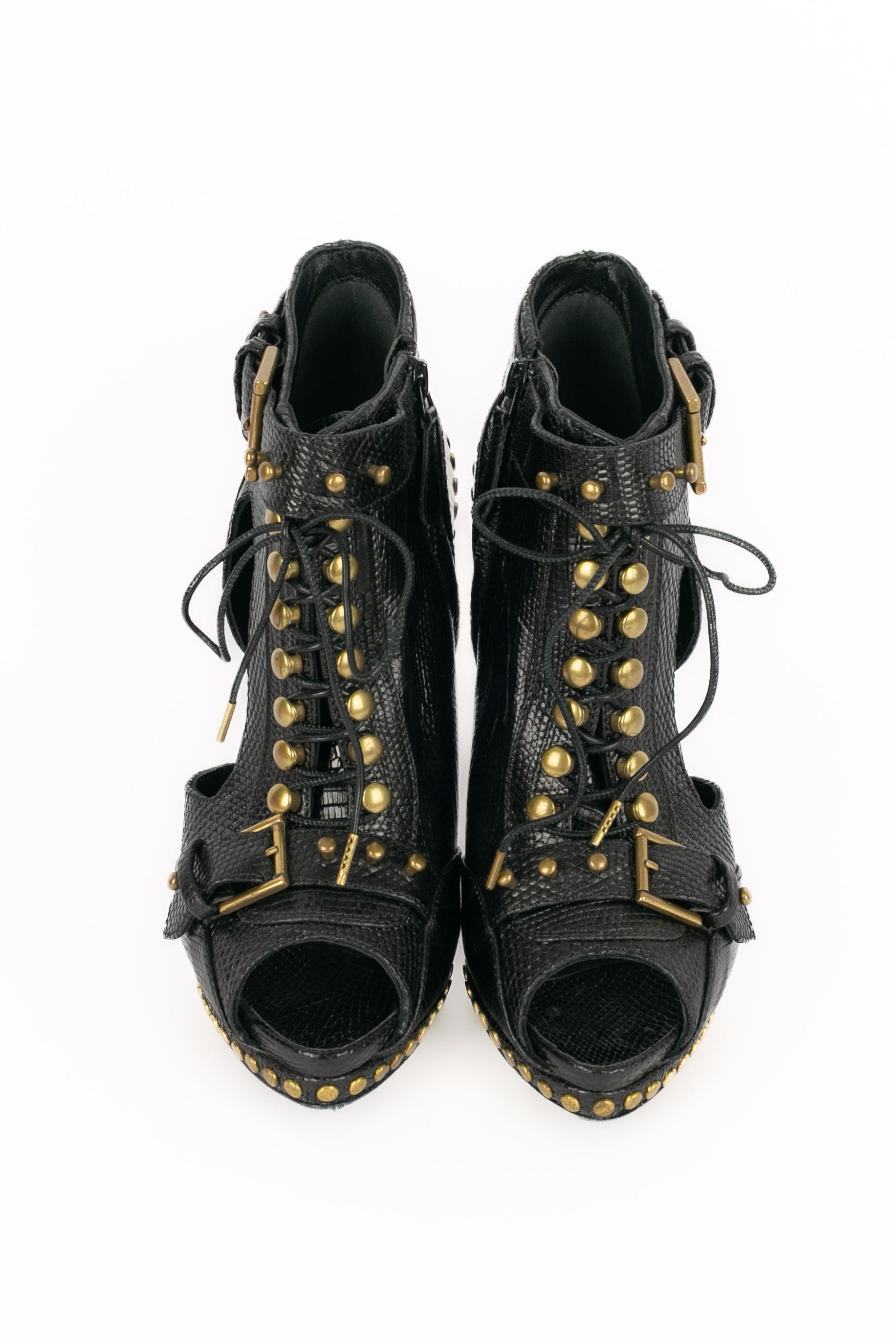 Alexander McQueen leather ankle boots Negro en venta