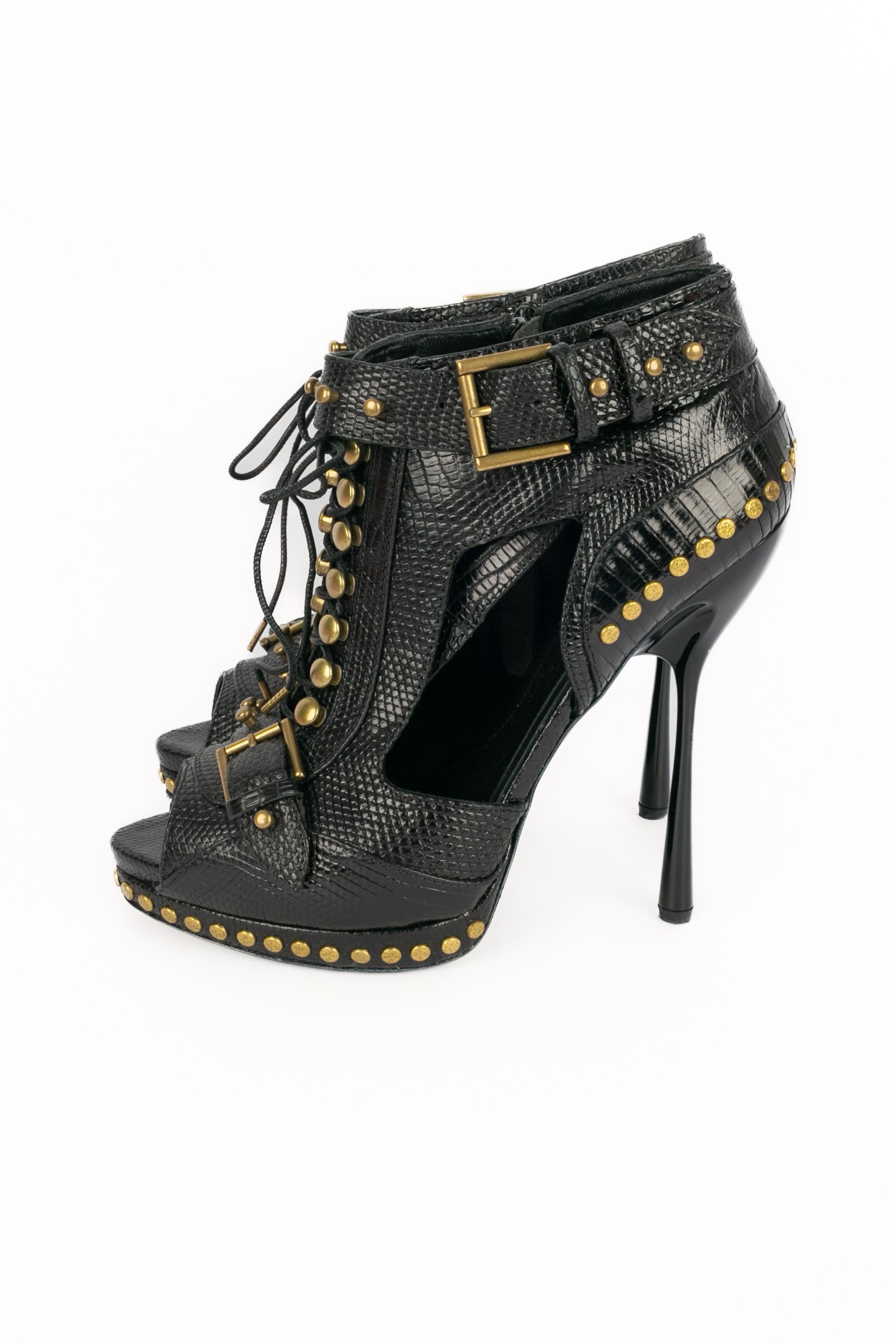 Alexander McQueen leather ankle boots en venta 1
