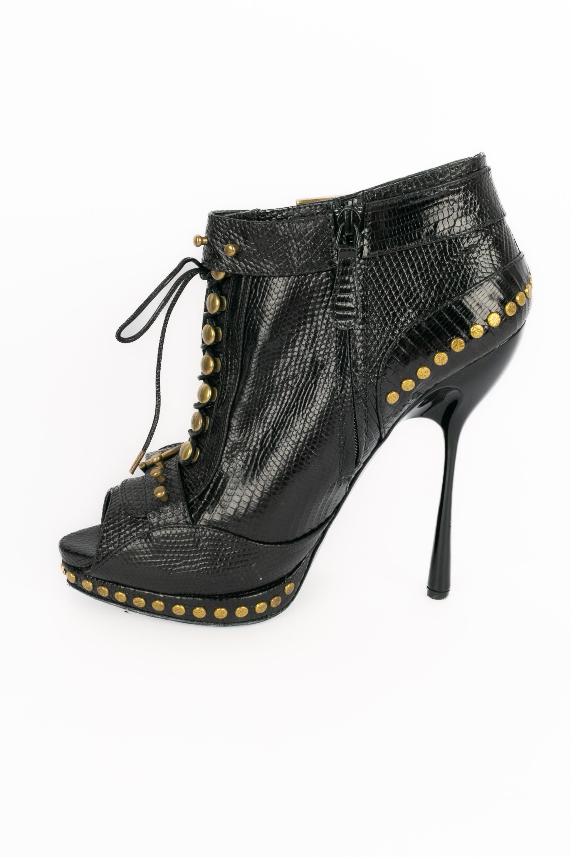 Alexander McQueen leather ankle boots en venta 2
