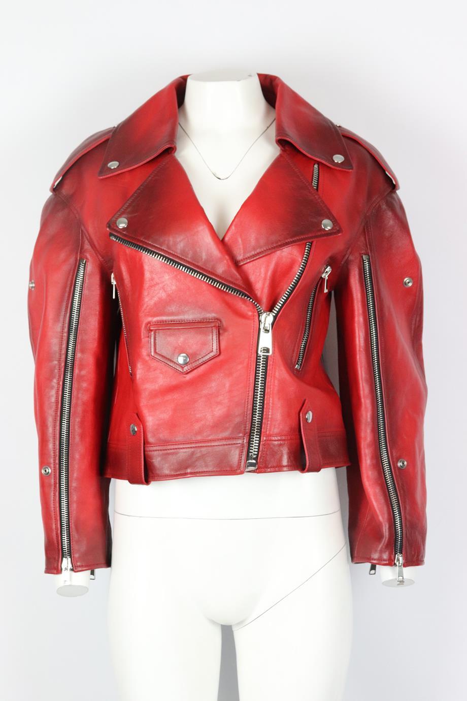 Alexander McQueen leather biker jacket. Red. Long sleeve, v-neck. Zip fastening at front. 100% Leather; lining: 100% viscose. Size: IT 42 (UK 10, US 6, FR 38). Shoulder to shoulder: 19 in. Bust: 40 in. Waist: 38 in. Hips: 40 in. Length: 20 in. Very