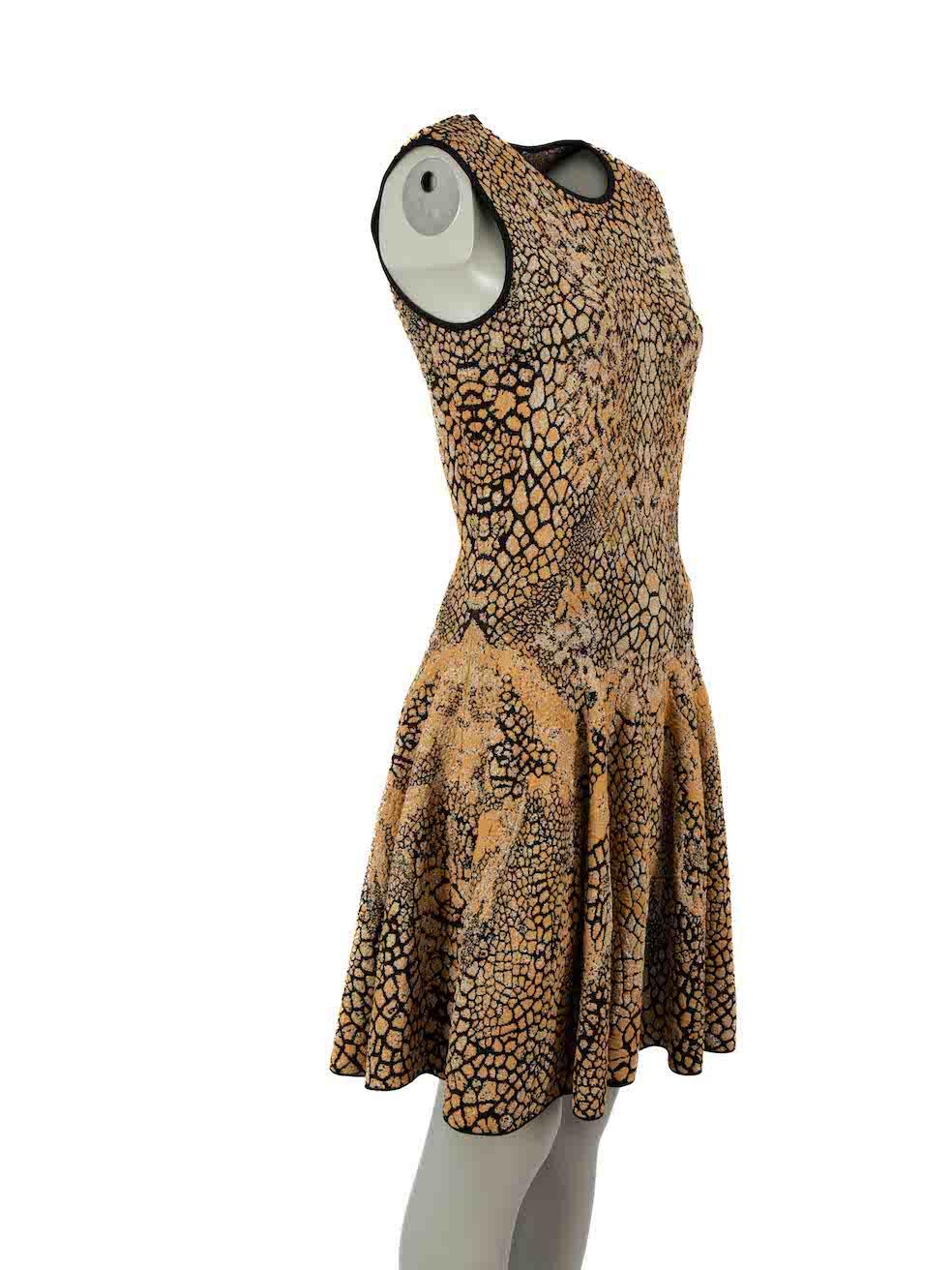 CONDITION is Very good. Minimal wear to dress is evident. Minimal wear to the front with small pulls to the weave on this used Alexander McQueen designer resale item.
 
 Details
 Brown
 Viscose
 Knit dress
 Sleeveless
 Round neck
 Leopard print
