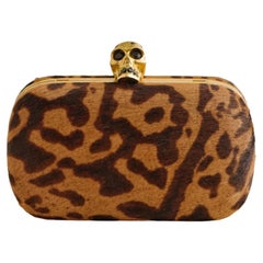 ALEXANDER MCQUEEN Bolso de mano en forma de caja con calavera y estampado de leopardo