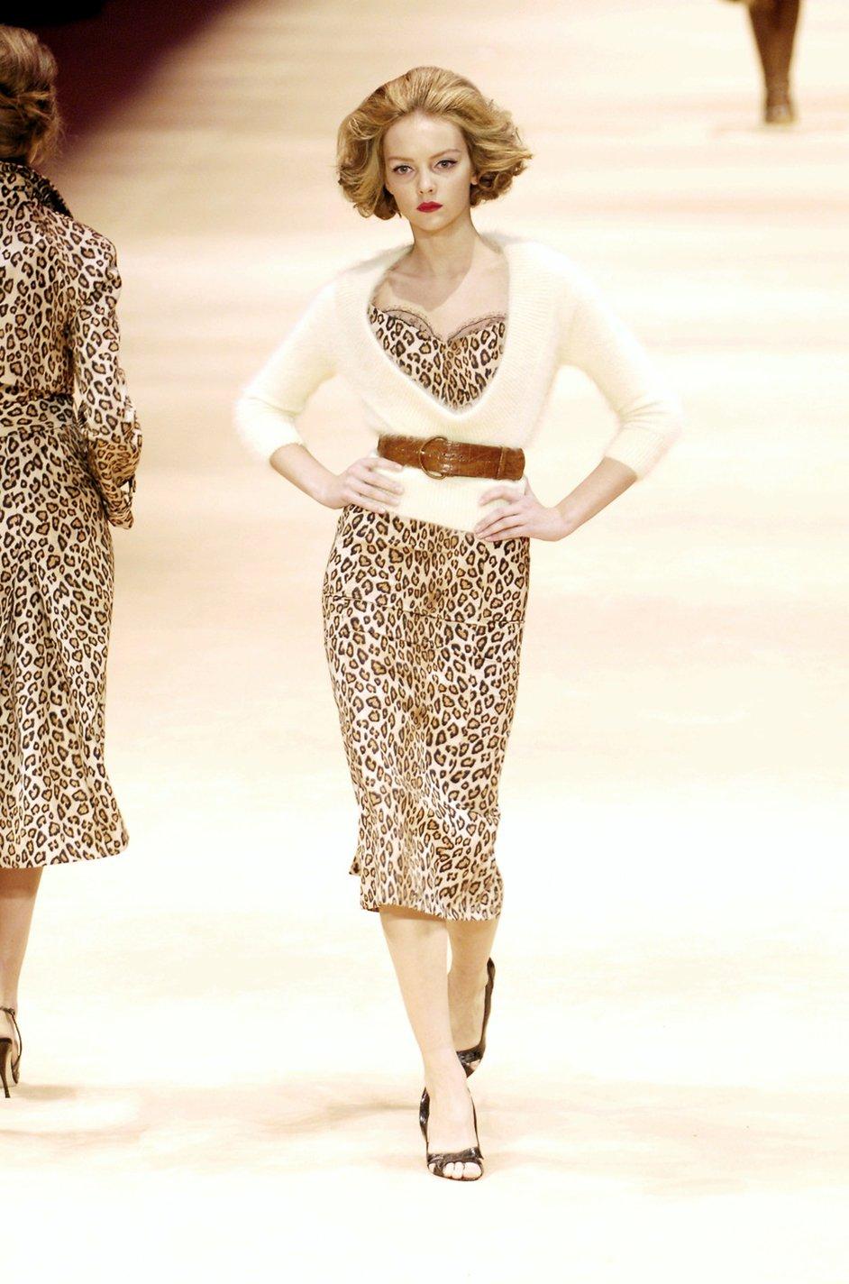Alexander McQueen Leopard Silk Dress. Dress is dated 2005. Fully lined in silk with an internal boned waist to maintain a sharp and clean shape. 