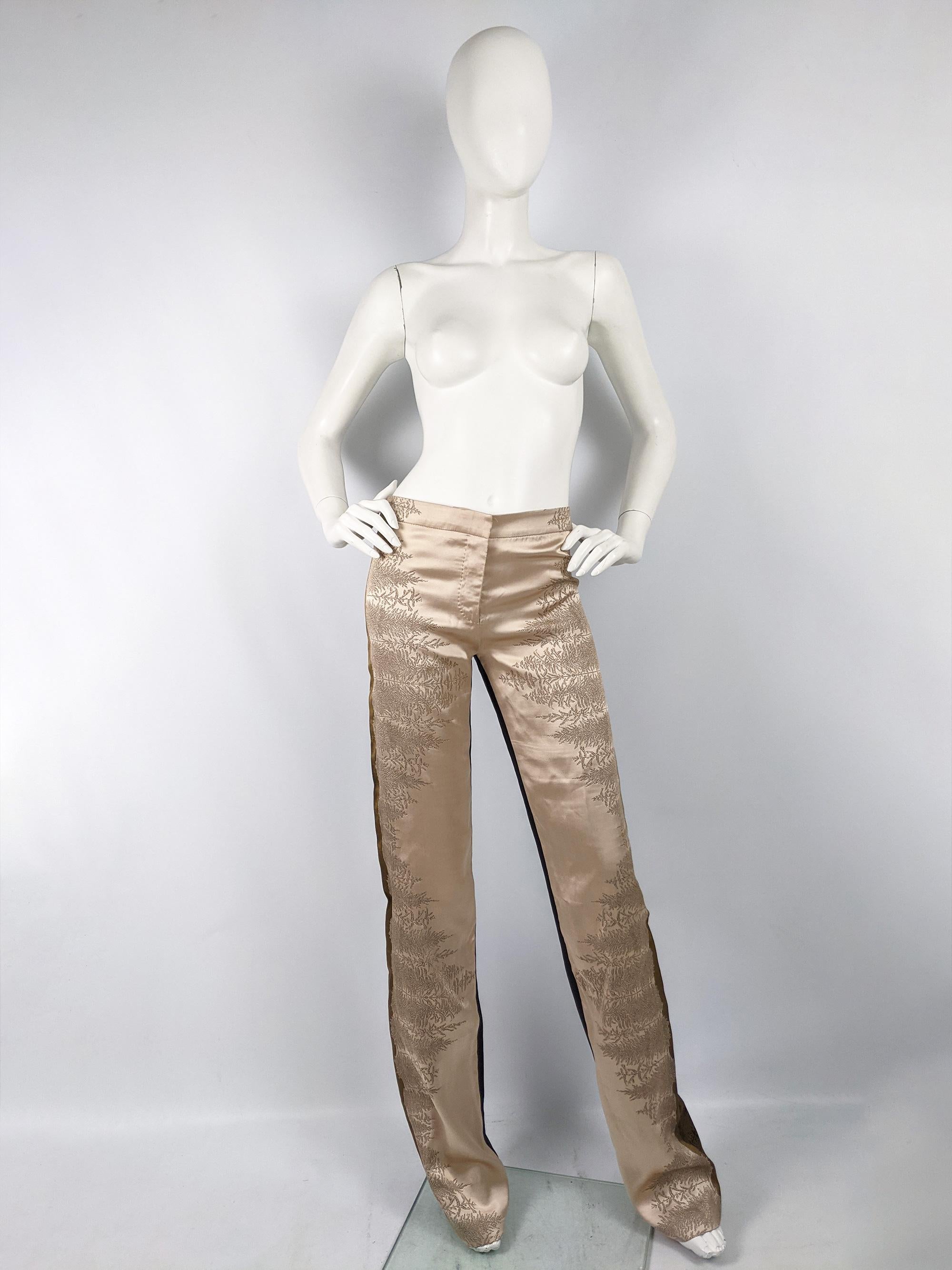 A fabulous pair of vintage Alexander McQueen trousers from the Pre-Spring 2008 collection. In a pale pink silk satin with a leaf pattern in jacquard weave on the front and a black silk with a gold brocade pattern at the back. In a typical McQueen