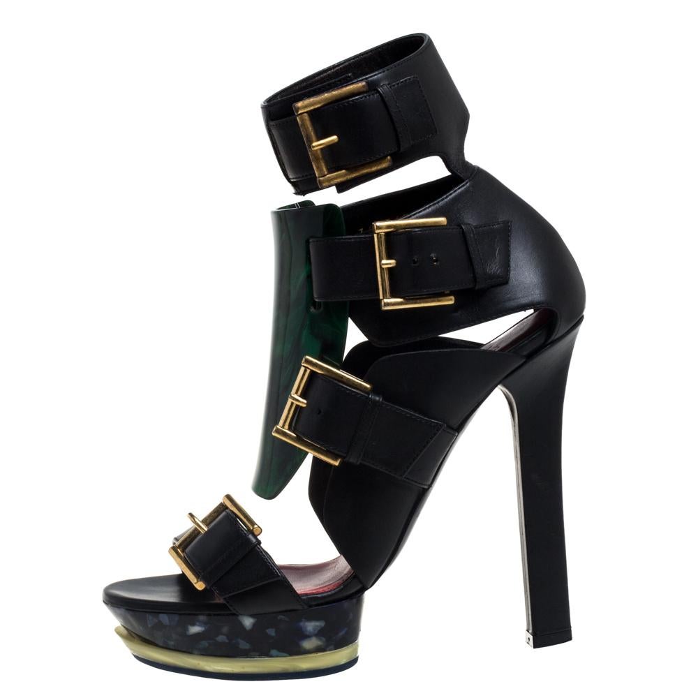 Incredibly chic, edgy, and one of a kind, these platform sandals from Alexander McQueen are sure to help you make an impression like never before! The multicolor sandals are crafted from an interesting combination of marble Flexi and leather and