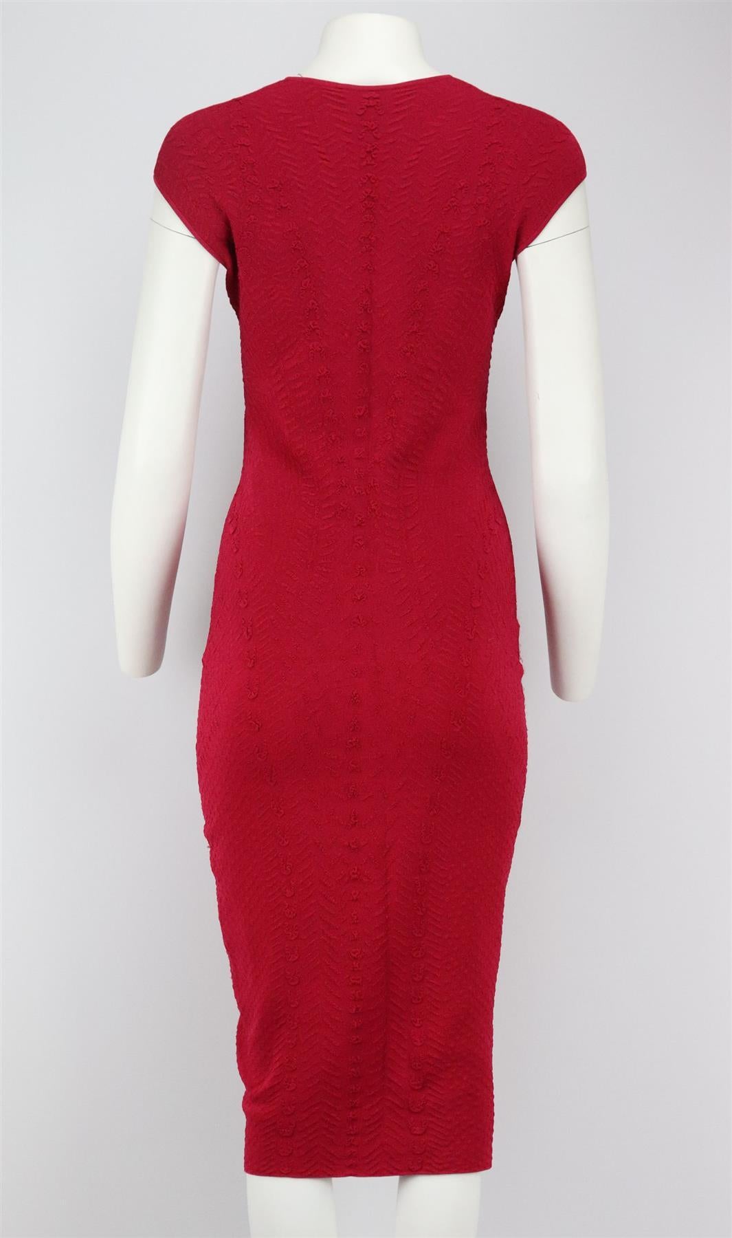 Work colour and texture into your new-season wardrobe with Alexander McQueen's red matelassé dress, this mid-weight stretch-knit style shapes and skims your figure and is woven with a raised floral pattern. Red matelassé stretch-knit. Slips on. 68%