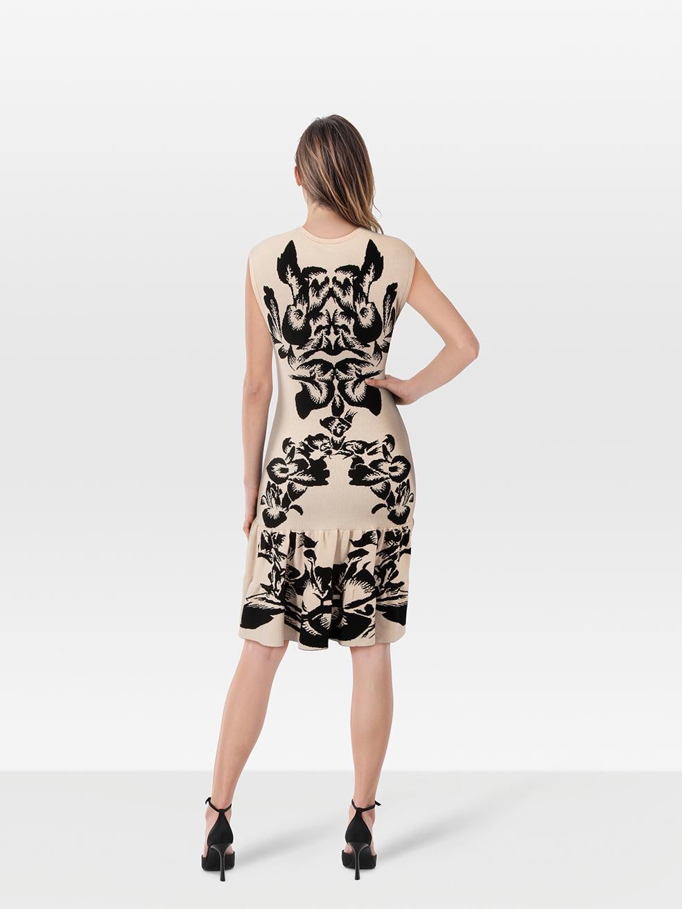 CONDITION is Never worn, with tags. No visible wear to the dress is evident on this new MCQ designer resale item.
 
 
 
 Details
 
 
 Multicolour- black, beige
 
 Viscose
 
 Dress
 
 Floral knit pattern
 
 Knee length
 
 Stretchy
 
 Round neck
 
