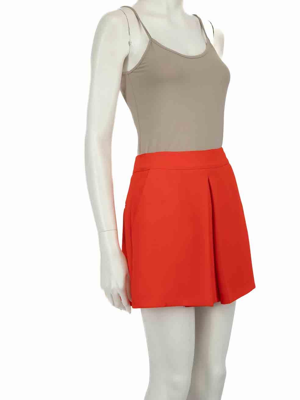 CONDITION is Very good. Minimal wear to skirt is evident. Minimal wear to the right-side of the front hem with a mark on this used McQ designer resale item.
 
 
 
 Details
 
 
 Orange
 
 Polyester
 
 Skirt
 
 Mini
 
 Pleated
 
 2x Side pockets
 
