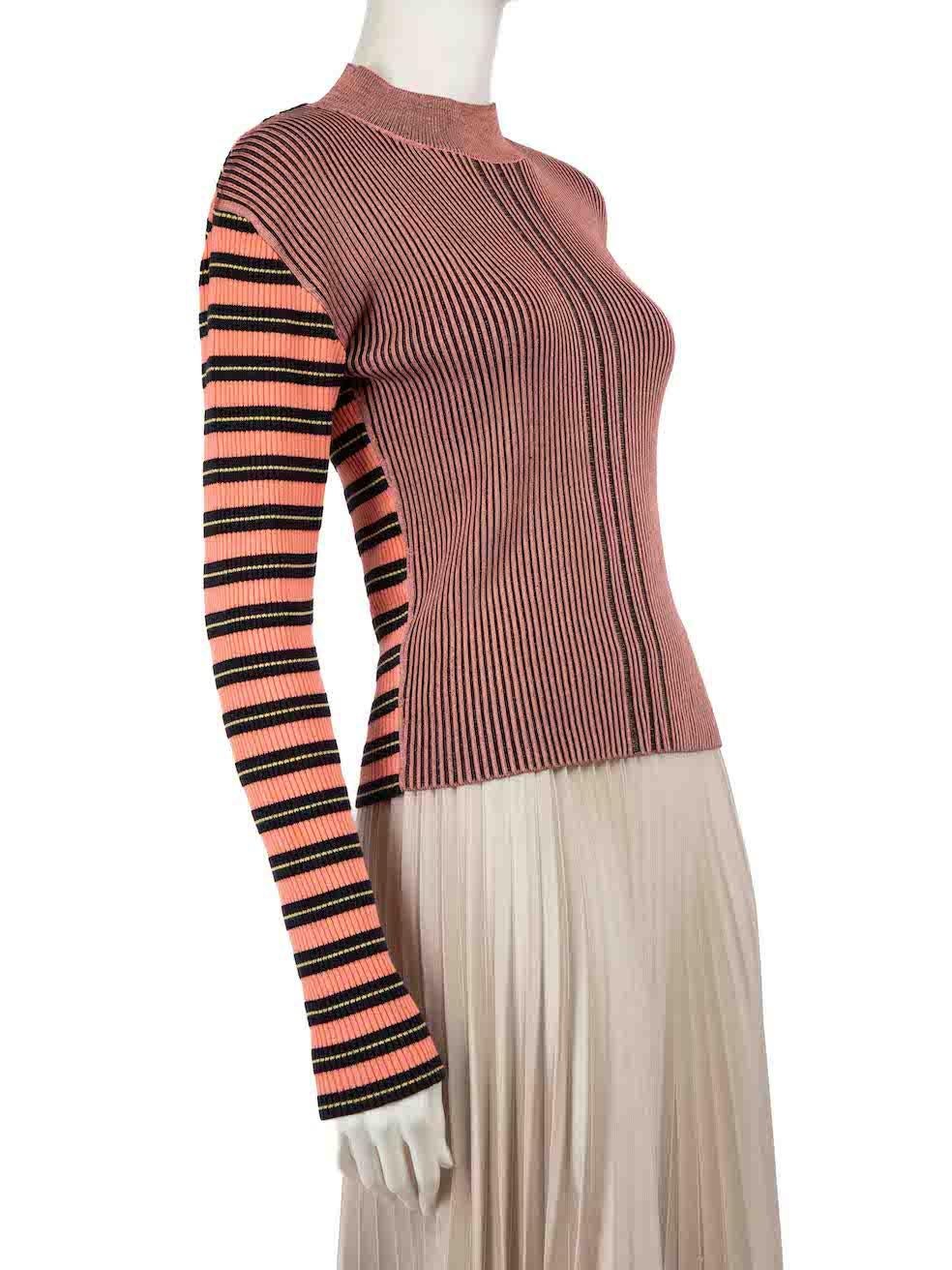 CONDITION is Very good. Minimal wear to top is evident. Minimal wear to the left sleeve cuff with a discoloured mark on this used McQ designer resale item.
 
 
 
 Details
 
 
 Pink
 
 Viscose
 
 Knit top
 
 Mock neck
 
 Striped pattern
 
 Stretchy
