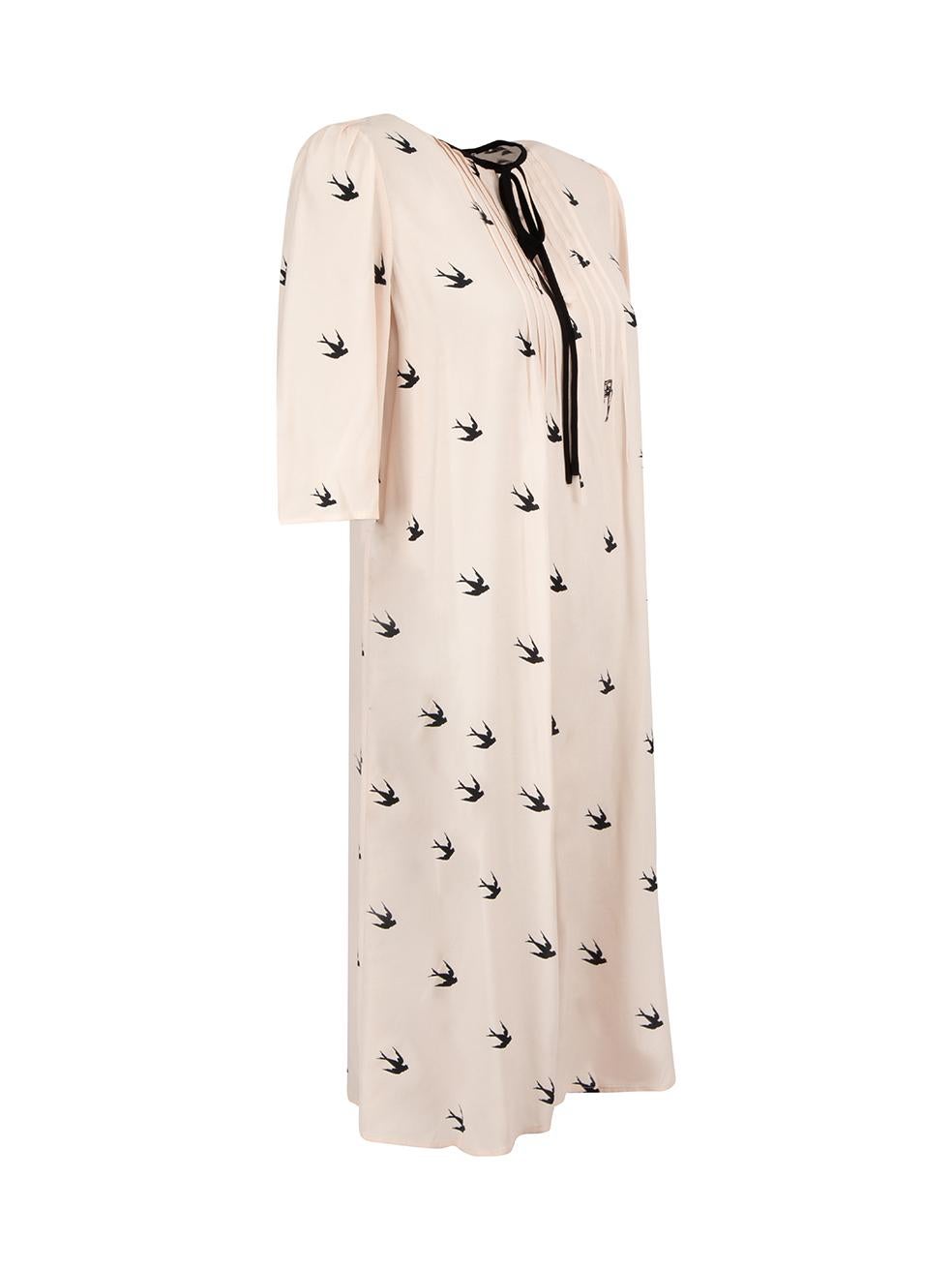 CONDITION is Never worn, with tags. Hardly any visible wear to dress is evident however small yellow marks found at interior side seam on this new McQ designer resale item.

Details
Pink
Synthetic
Dress
Swallow print
1/2 Sleeves
Round neck
Button