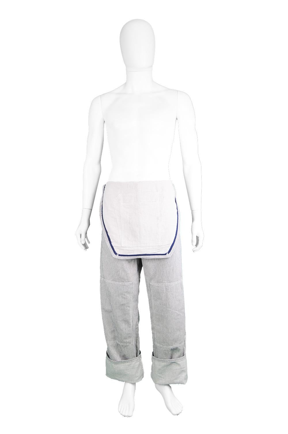Alexander McQueen Men's Pinstripe Cotton Overall Pants with Bib Front

Size: Waist - 36” / 91cm
Inside Leg - 33” / 84cm (meant to be cuffed)
Length (Waist to Hem) - 44” / 112cm
Rise - 14” / 35cm

Condition: Excellent Preowned Condition - Very light