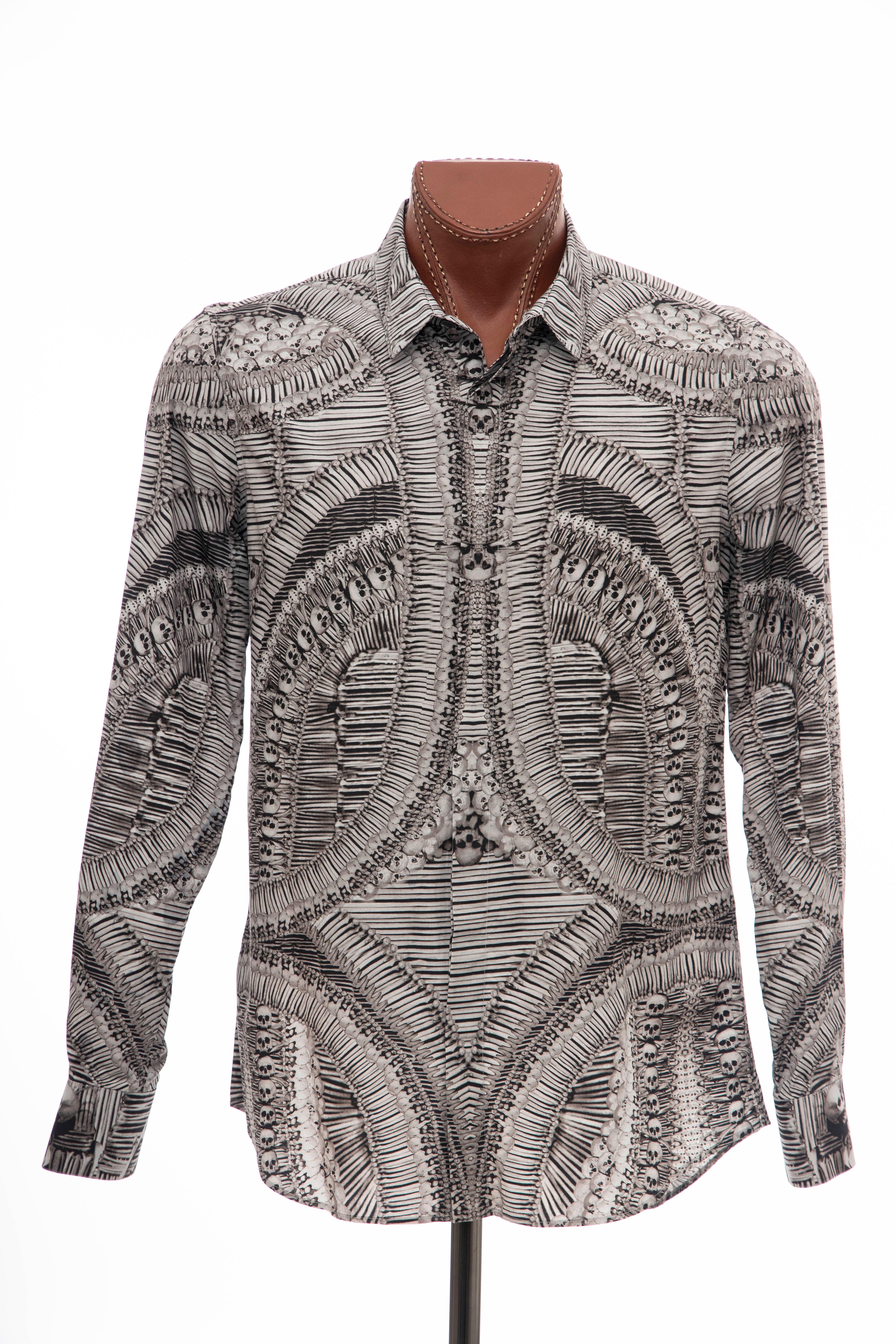 Alexander McQueen, Runway (Look 2),  Fall 2010  by Lee McQueen, Men's taupe, grey and black cotton skeleton print shirt with point collar, barrel two-button cuffs and hidden button closures at front.

IT. 52, US. 42

Chest: 44, Waist: 42, Shoulder: