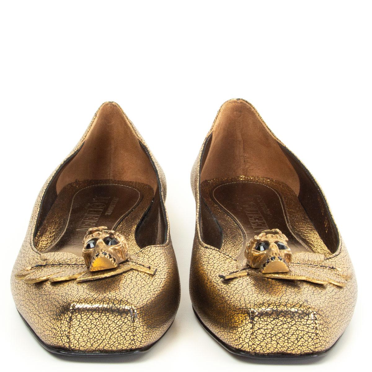 100% authentic Alexander McQueen square-toe ballet flats in wrinkled gold-tone calfskin embellished with a leaf and metal skull with black crystal eyes and teeth. Brand new. 

Measurements
Imprinted Size	39.5
Shoe Size	39.5
Inside Sole	26cm