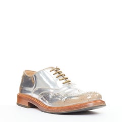 ALEXANDER MCQUEEN metallic silver leather perforated wingtip brogue shoes EU43