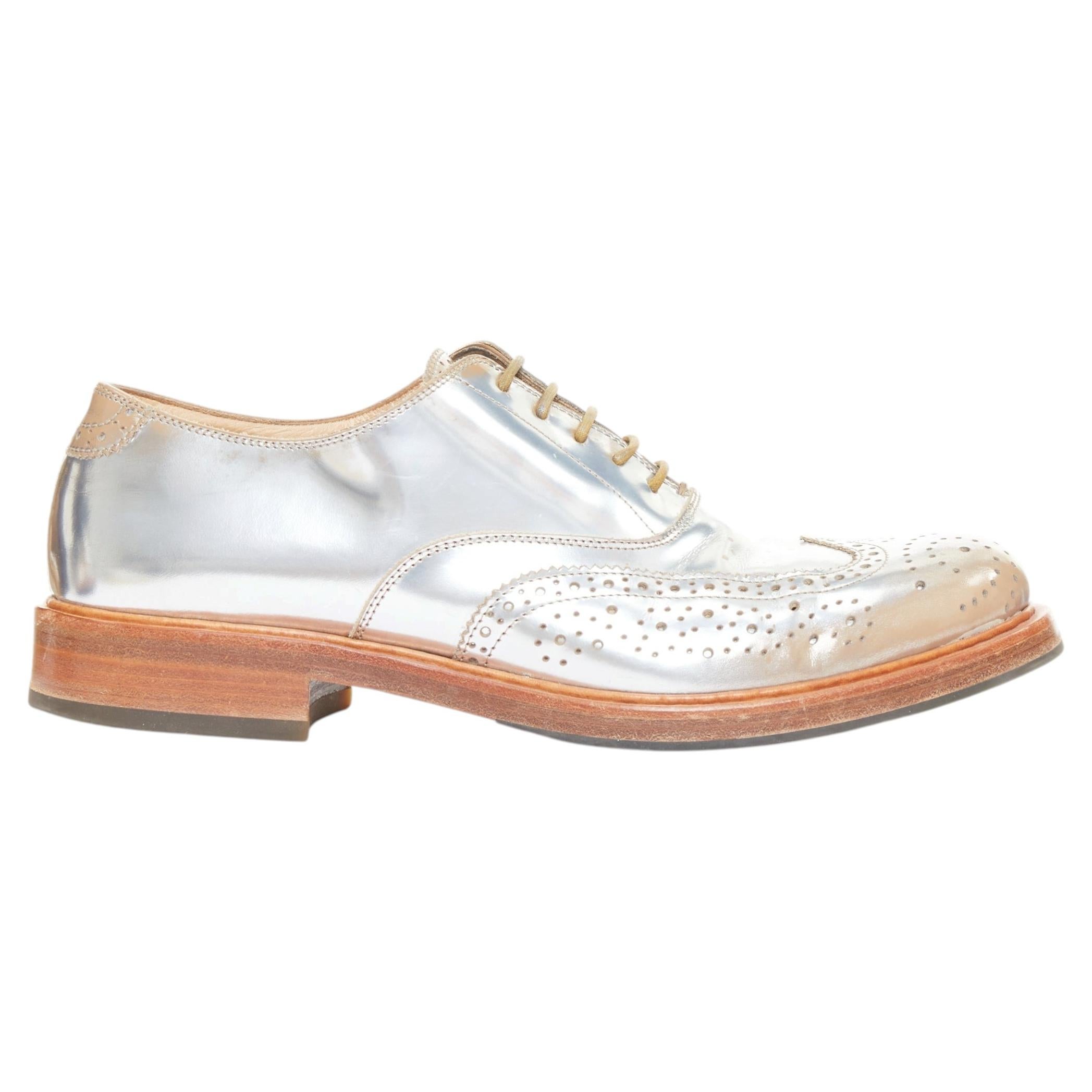 ALEXANDER McQueen chaussures à bouts papillons en cuir perforé argenté métallique EU43
