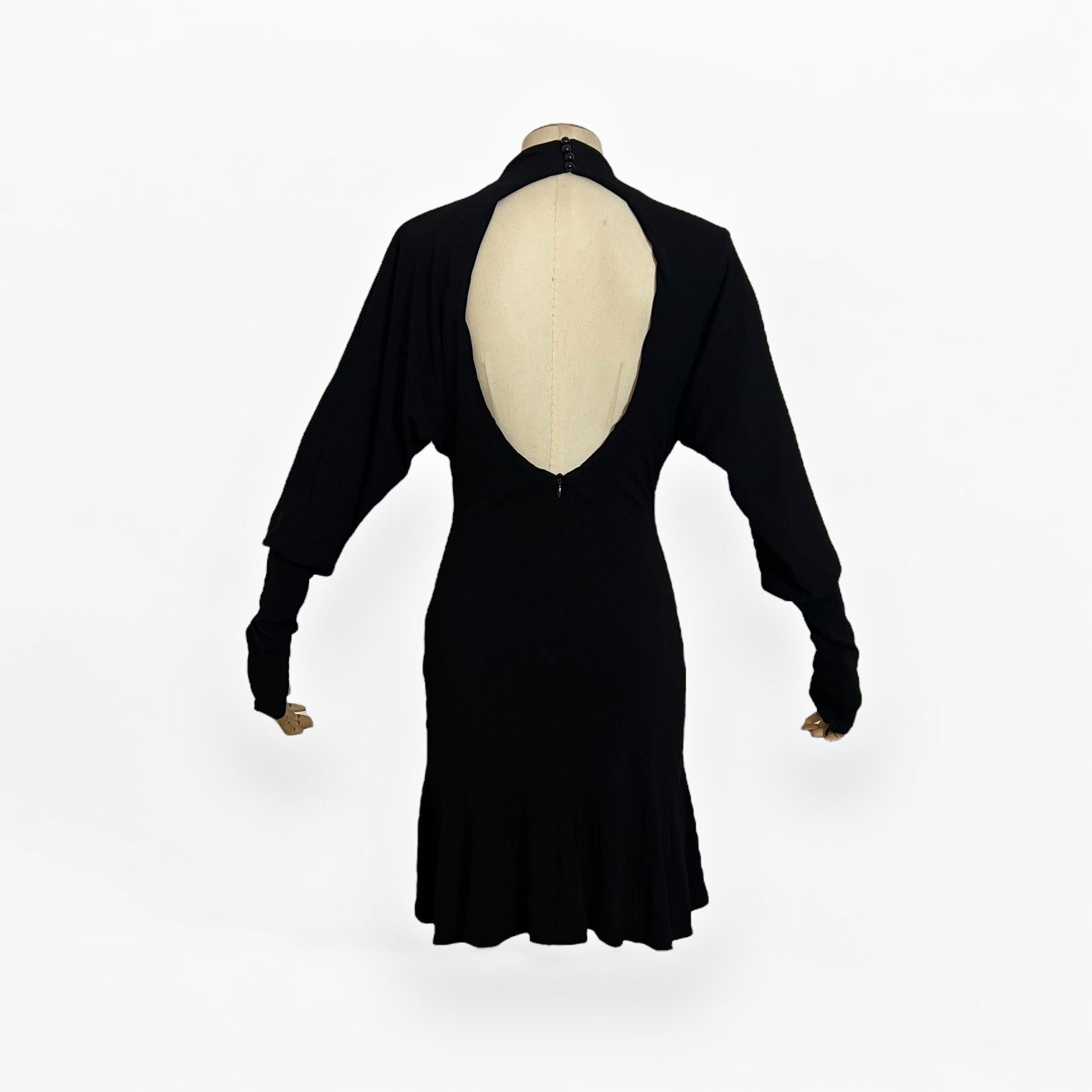 
This stunning Alexander McQueen mini dress from the Fall/Winter 2004 collection, 