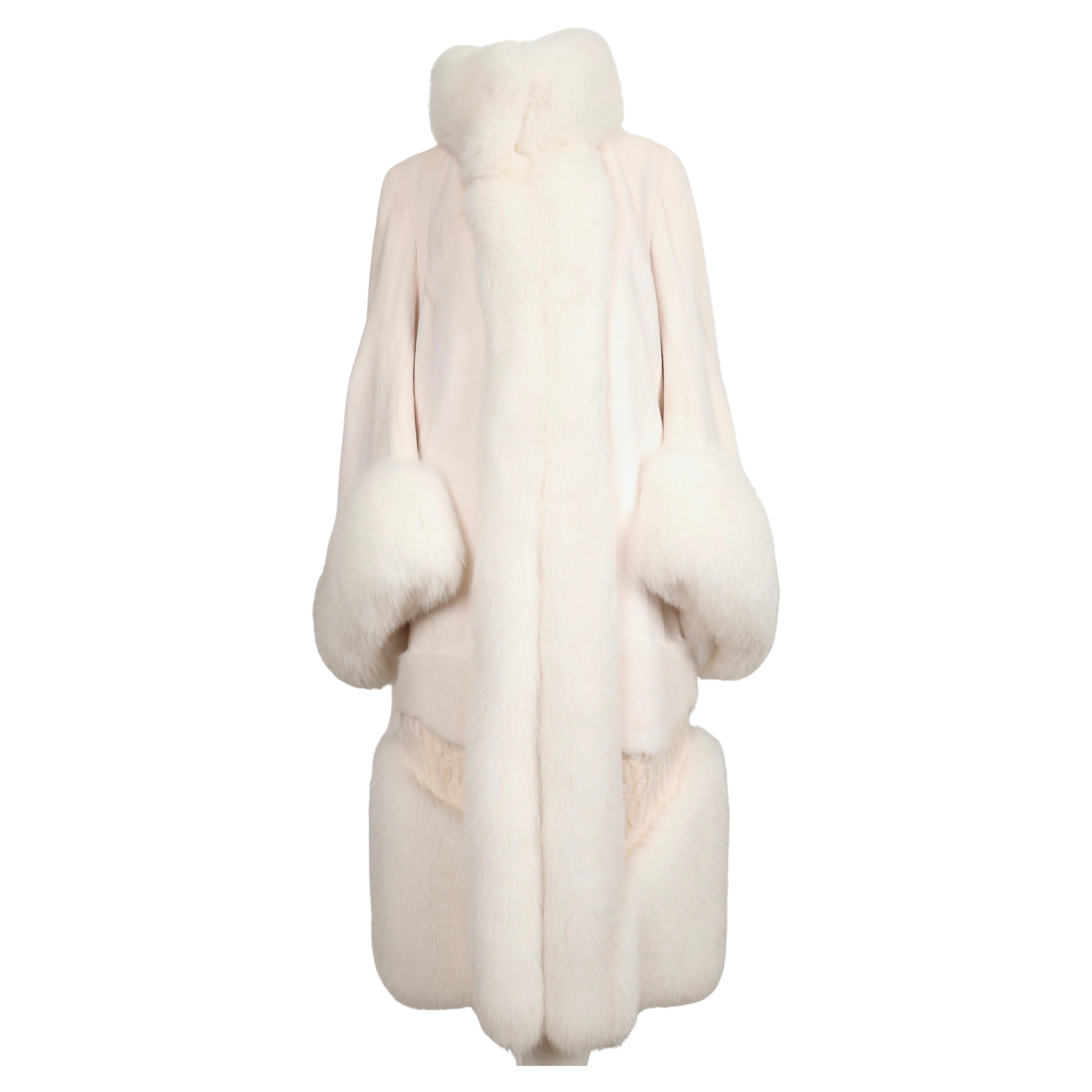 Very rare and dramatic off-white fur coat made of mink, fox and lamb fur from  Alexander McQueen. Labeled an Italian size 42. Approximate measurements: shoulder 16