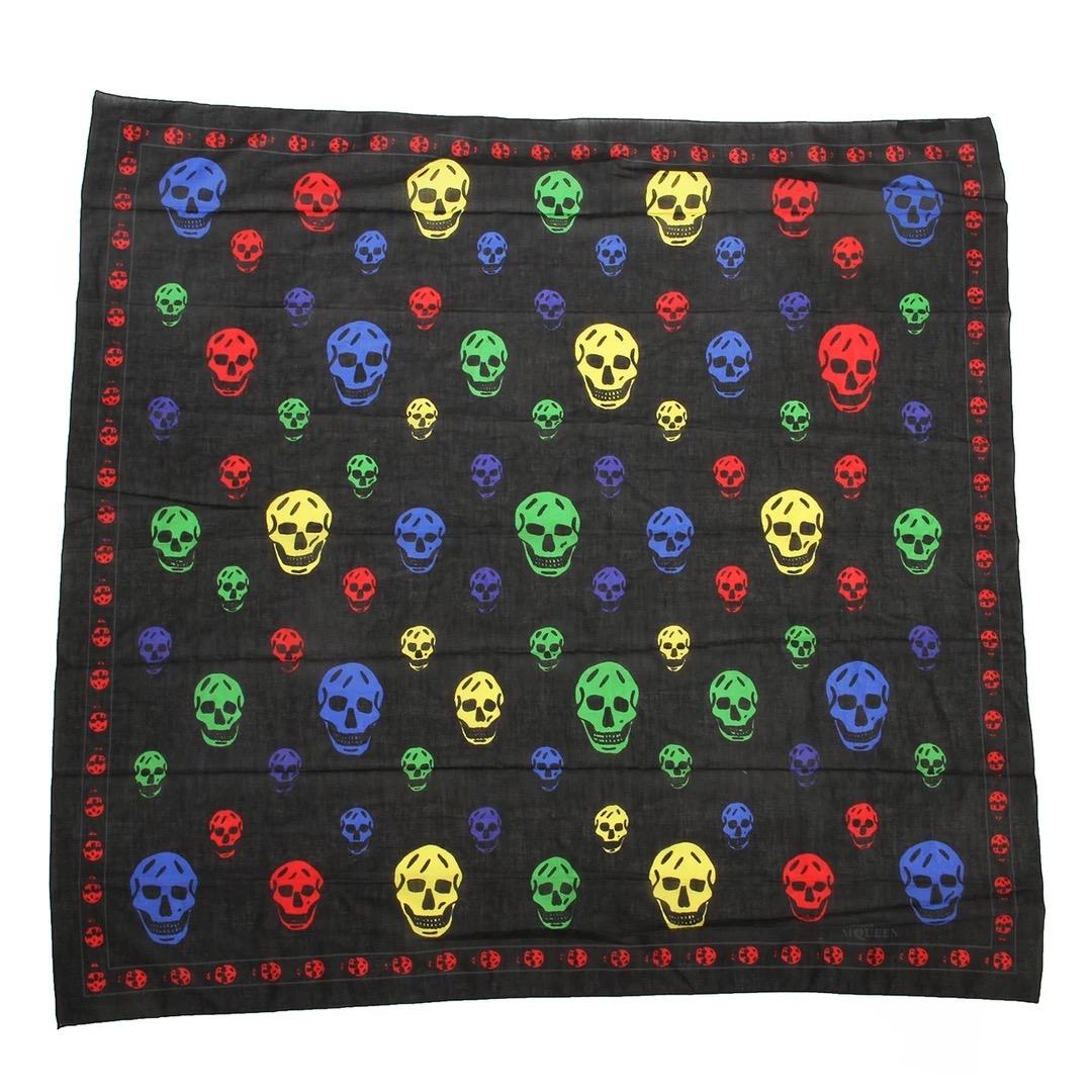 Alexander McQueen Skull Scarf
Made in Italy 
100% Cotton 
Black scarf withe red, green and blue skull print
Red skull border
Hemmed edges
Condition excellent; Preloved with no signs of wear or use.
Size/Measurements:
39