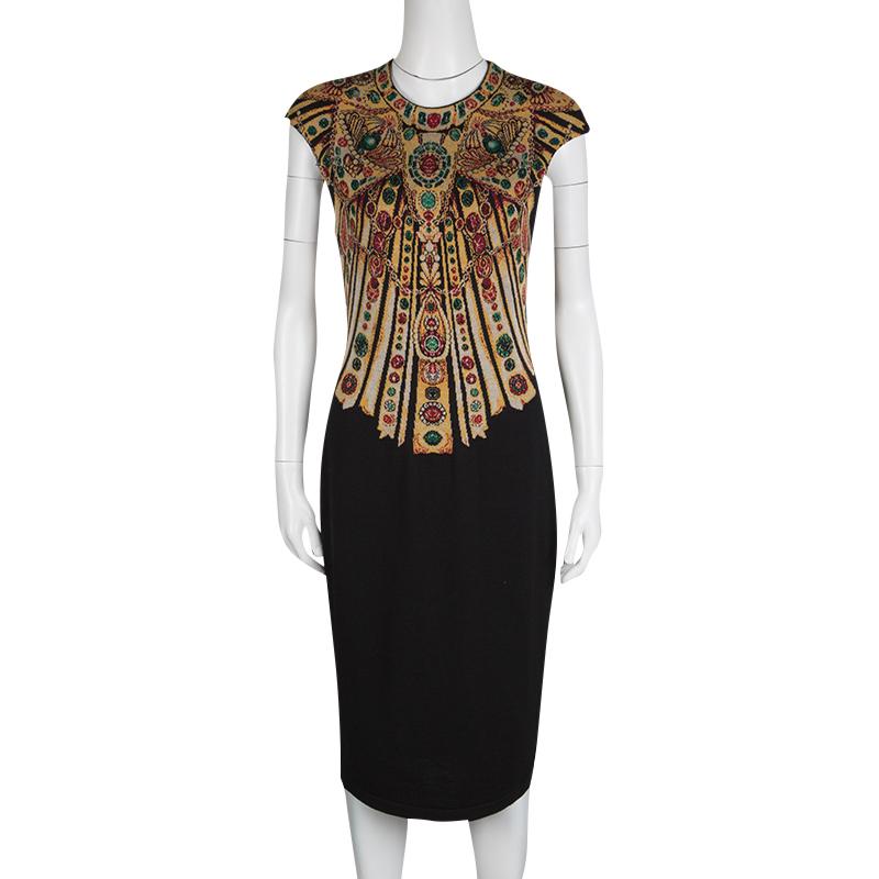 Create the most eye catching and fascinating looks with minimal effort using this stunning Alexander McQueen cap sleeve midi dress. Constructed in black wool blended knit fabric, this dress features a multicoloured jewelled sunburst pattern all