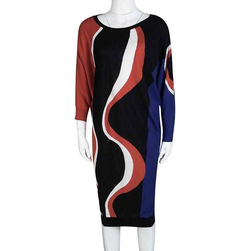 A fabulous dress like this one from Alexander McQueen deserves to have a place in every fashionista's closet. Luxuriously made from wool and designed with multicolor patterns, this dress has dolman sleeves and a hem ending below the knees. It'll