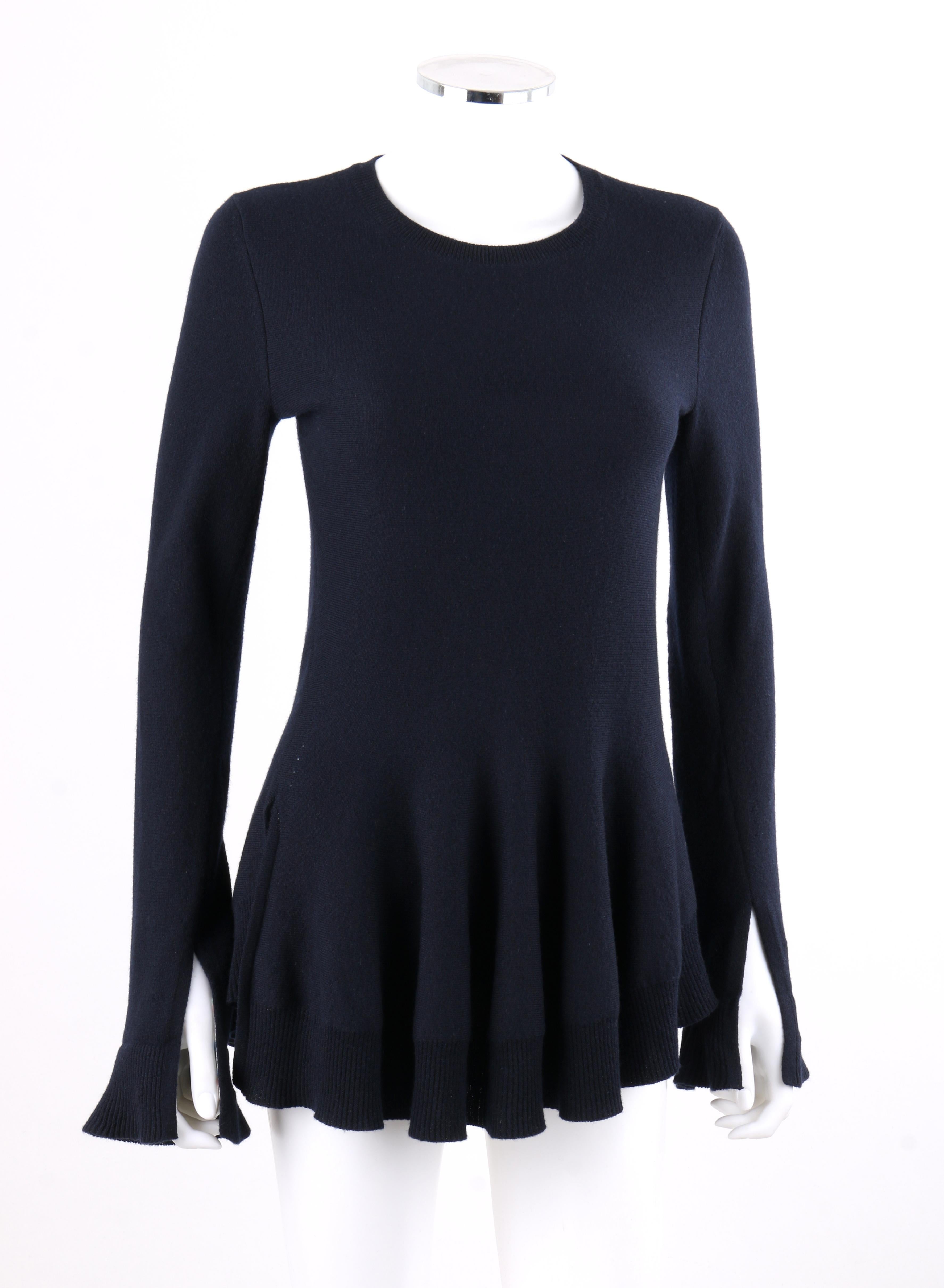 DESCRIPTION: ALEXANDER McQUEEN Navy Blue Cashmere Knit Peplum Sweater
 
Estimated Retail: $1,310
 
Brand / Manufacturer: Alexander McQueen
Collection: 
Designer: Sarah Burton
Manufacturer Style Name: 
Style: Peplum sweater
Color(s): Navy blue
Lined:
