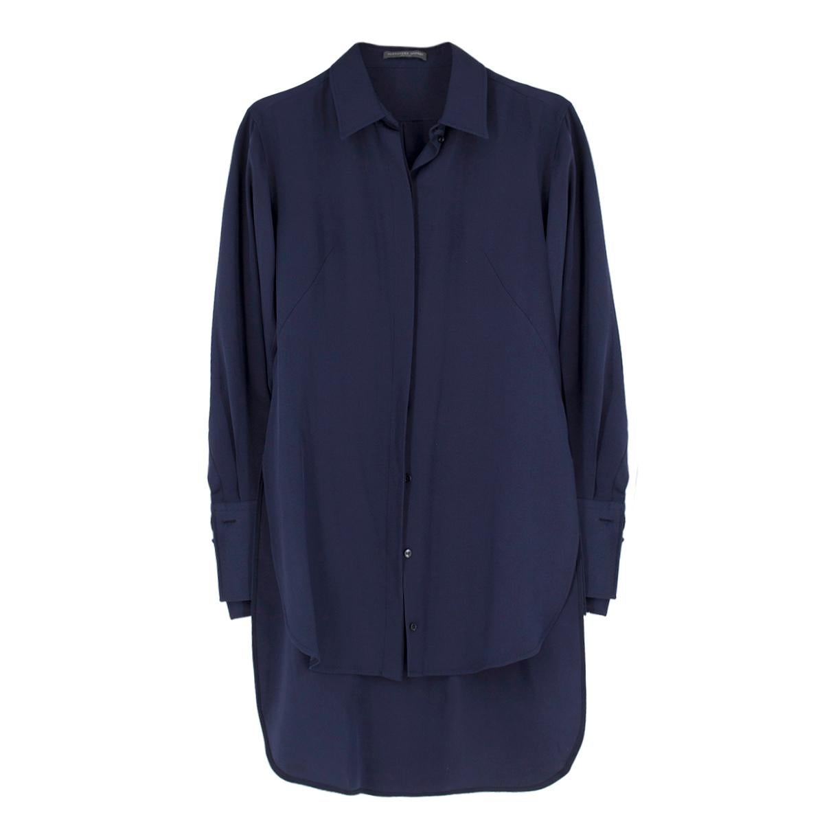 Alexander Mcqueen Navy Silk Shirt

- Navy silk shirt
- Lightweight
- Pointed collar
- Centre-front concealed button fastening
- Ruched buttoned cuffs
- Step back hem
- Straight loose fit
- 100% silk

Please note, these items are pre-owned and may