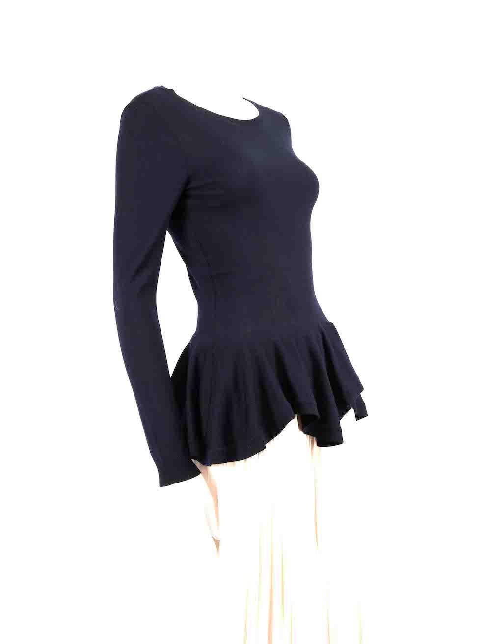 CONDITION is Very good. Hardly any visible wear to top is evident on this used Alexander McQueen designer resale item.
 
 Details
 Navy
 Wool
 Knit top
 Long sleeves
 Round neck
 Stretchy
 Peplum hem
 
 
 Made in Italy
 
 Composition
 100% Wool
 

