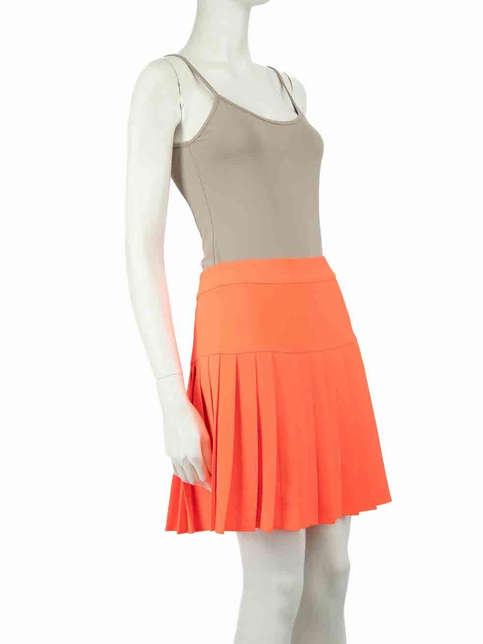CONDITION is Very good. Hardly any visible wear to skirt is evident on this used McQ by Alexander McQueen designer resale item.
  
  
  
  Details
  
  
  Neon orange
  
  Polyester
  
  Skirt
  
  Pleated
  
  Mini
  
  Side zip and hook fastening
