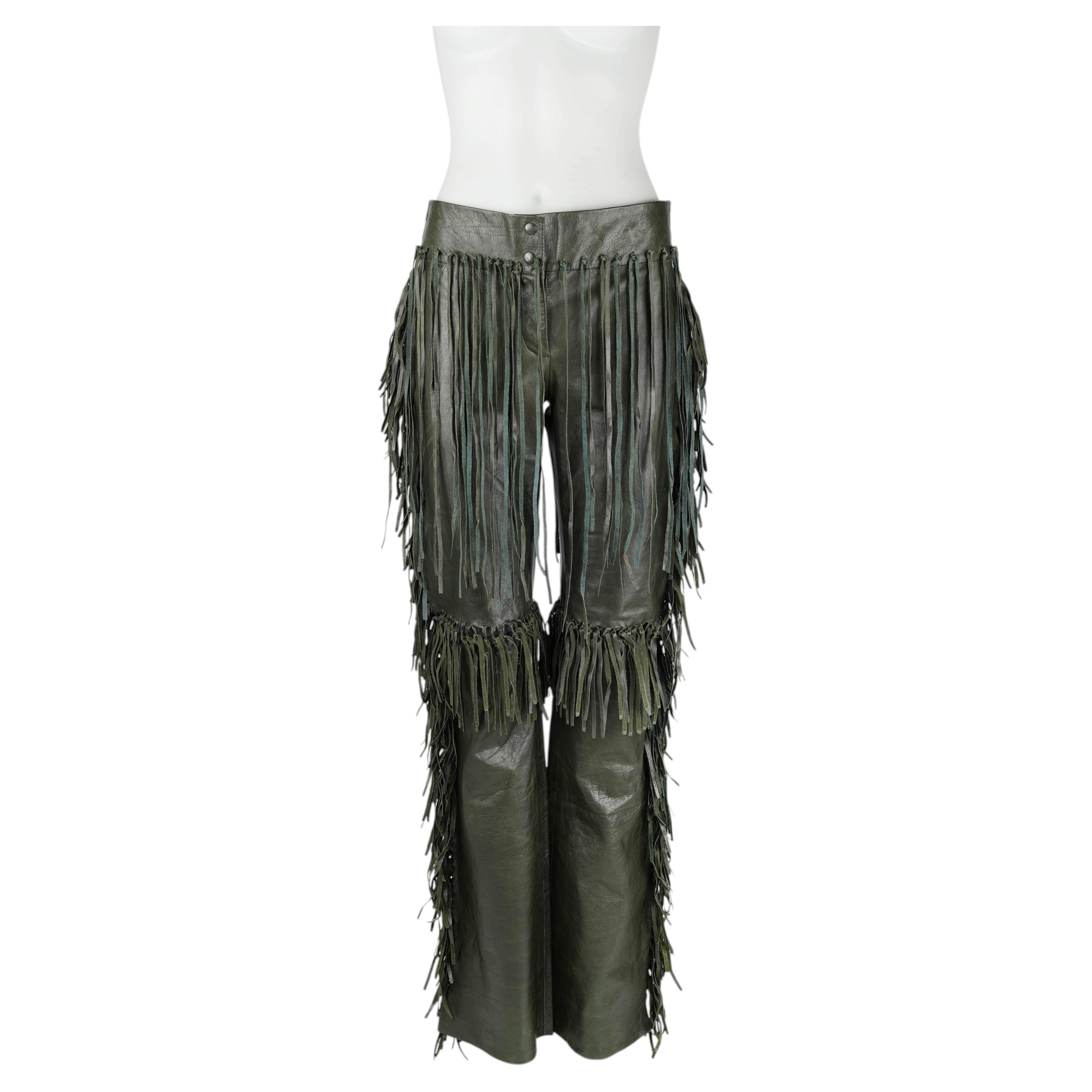 Who owns Alexander McQueen?