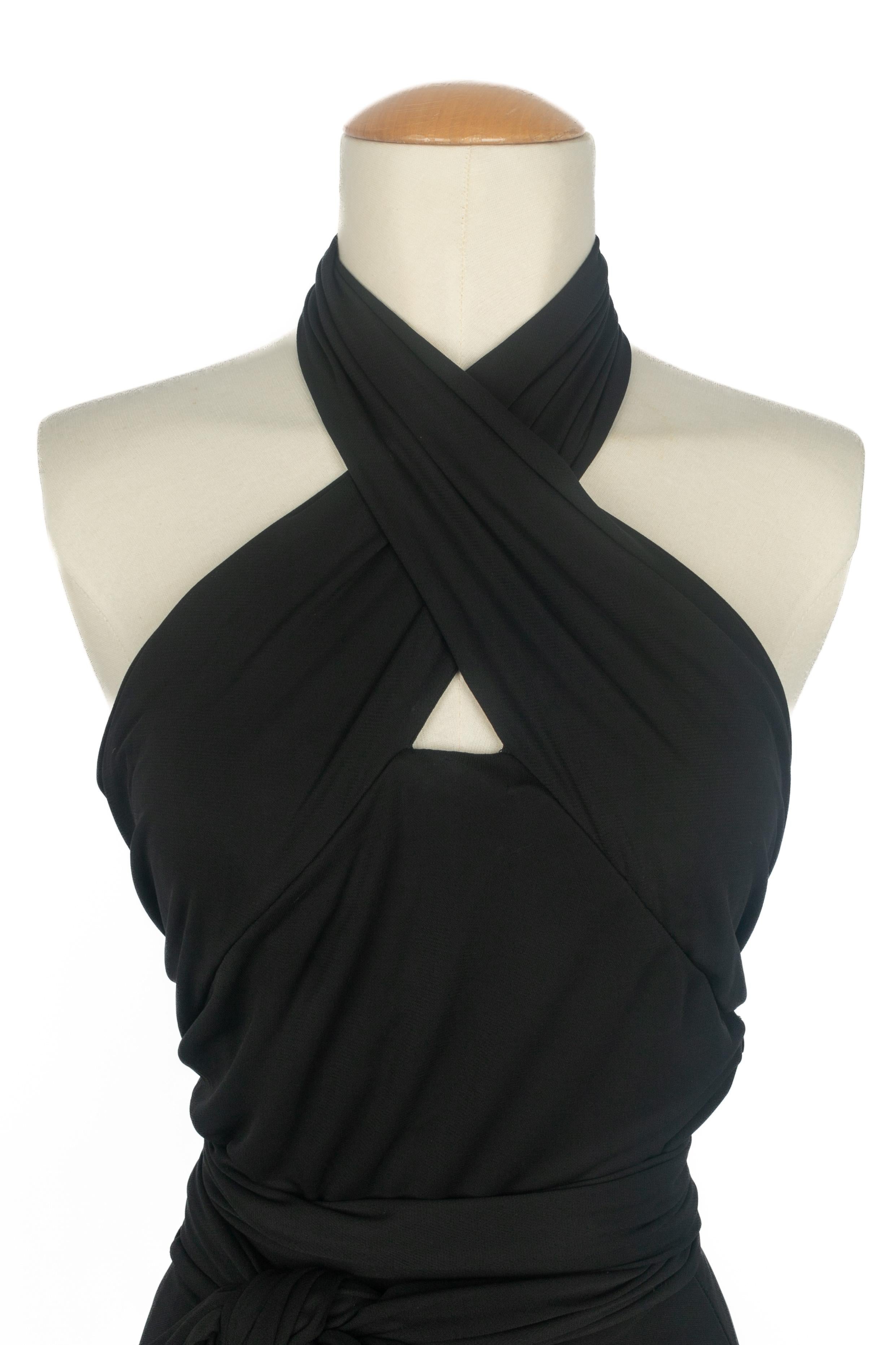 ALEXANDER MCQUEEN - (Made in Italy) Langes schwarzes Jerseykleid. Größe 38FR.

Bedingung:
Sehr guter Zustand

Abmessungen:
Brustumfang: 42 cm - Länge: ca. 170 cm

SKU:VR416