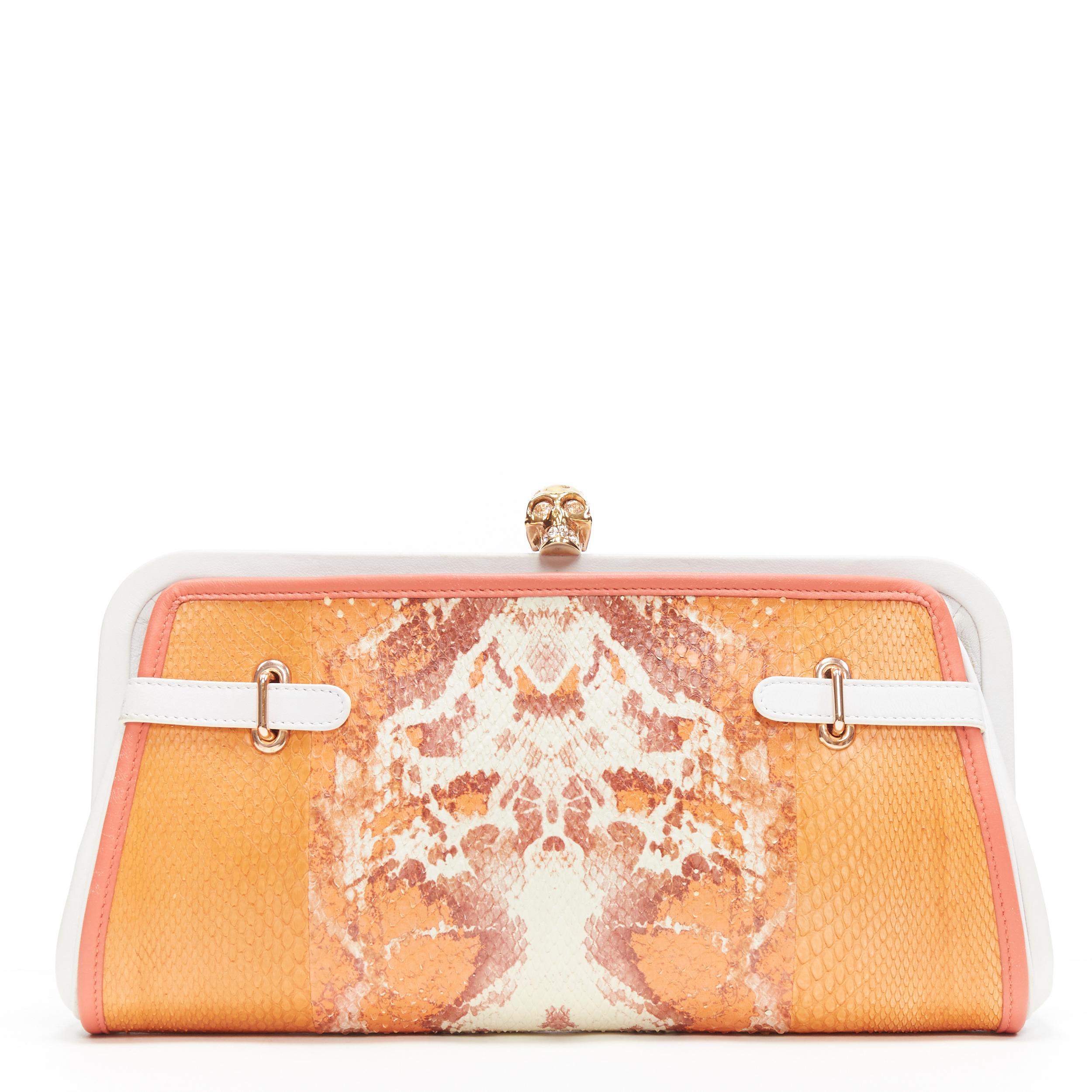 orange and gold clutch bag