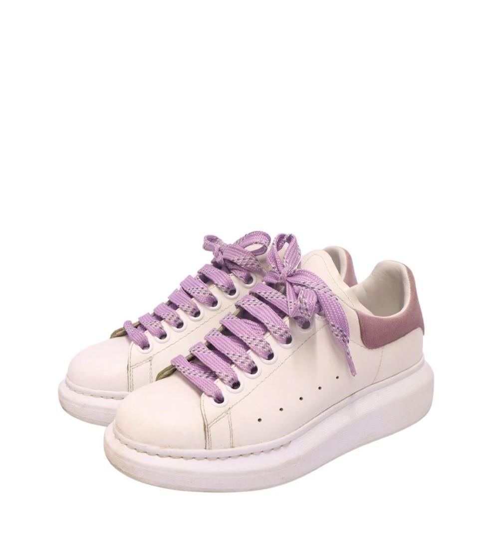 Alexander McQueen Oversized White Sneakers, features a round-toe, lace-up style and a platform.

Material: Leather 
Size: EU 35.5
Overall Condition: Fair
Interior Condition: Signs of use
Exterior Condition: Stains and marks