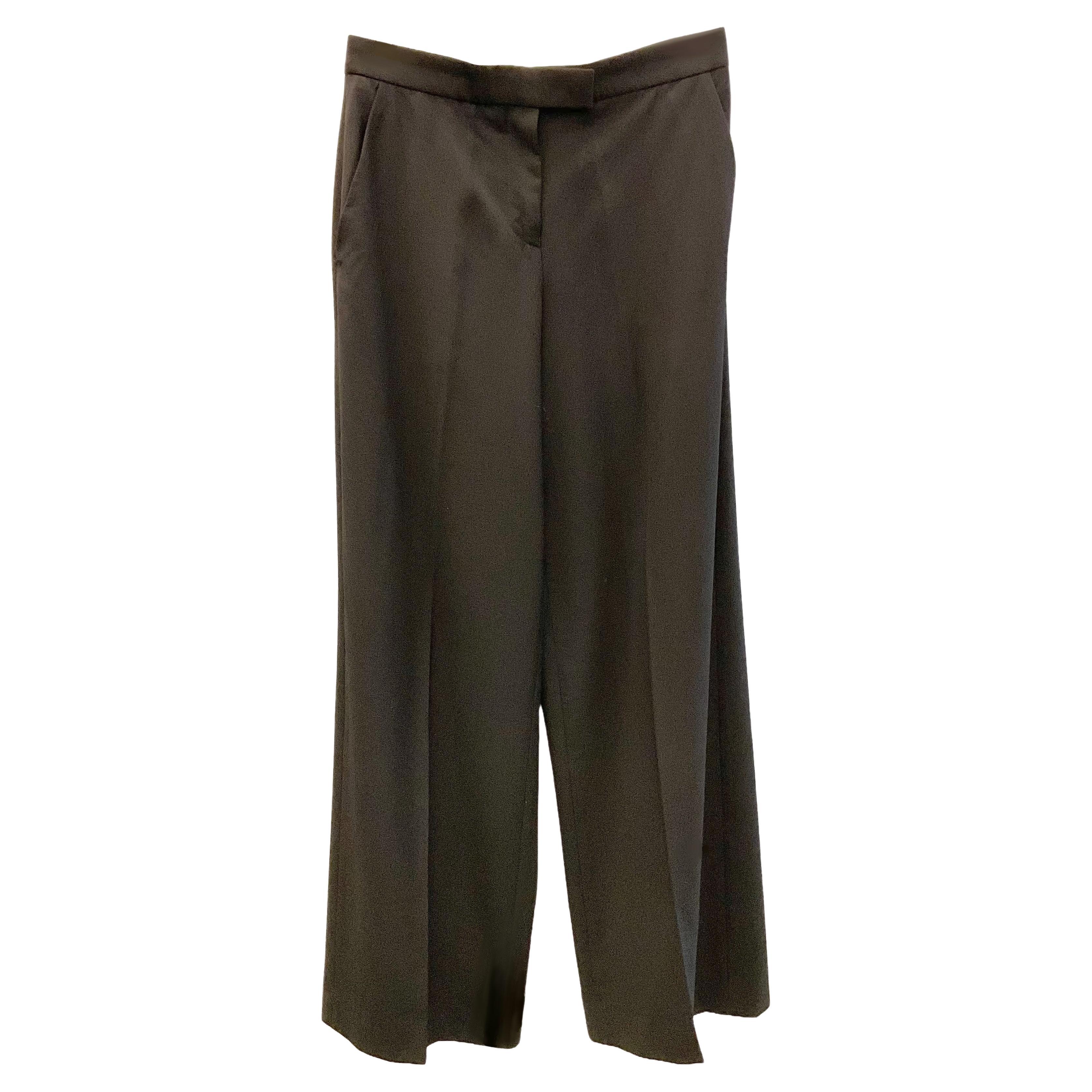 ALEXANDER McQUEEN Pantalon de tailleur noir en laine froide. en vente