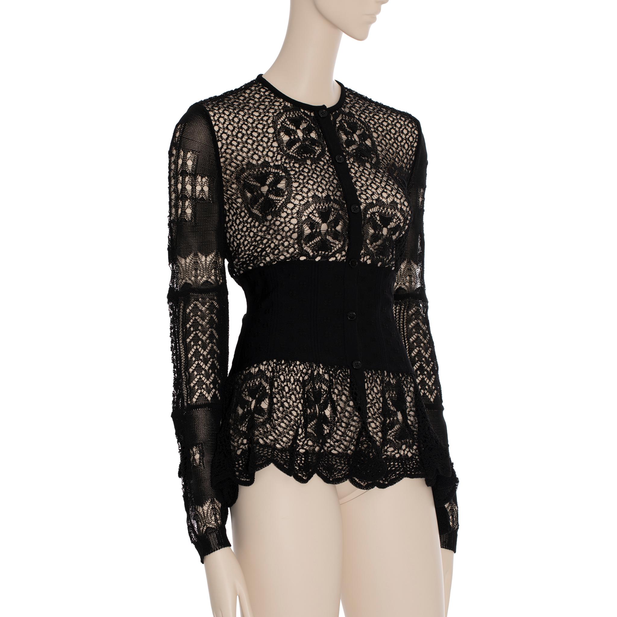 Brand: Alexander McQueen

Product: Patchwork Lace Peplum Cardigan

Size: Small

Sleeve: 63 Cm | Length: 60 Cm | Bust: 80 Cm | Waist: 64 Cm

Colour: Black

Material 65% Cotton, 35% Polyamide

Condition: Pristine

The product is in pristine condition,