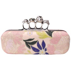 Alexander McQueen pink leather “Knuckle” clutch