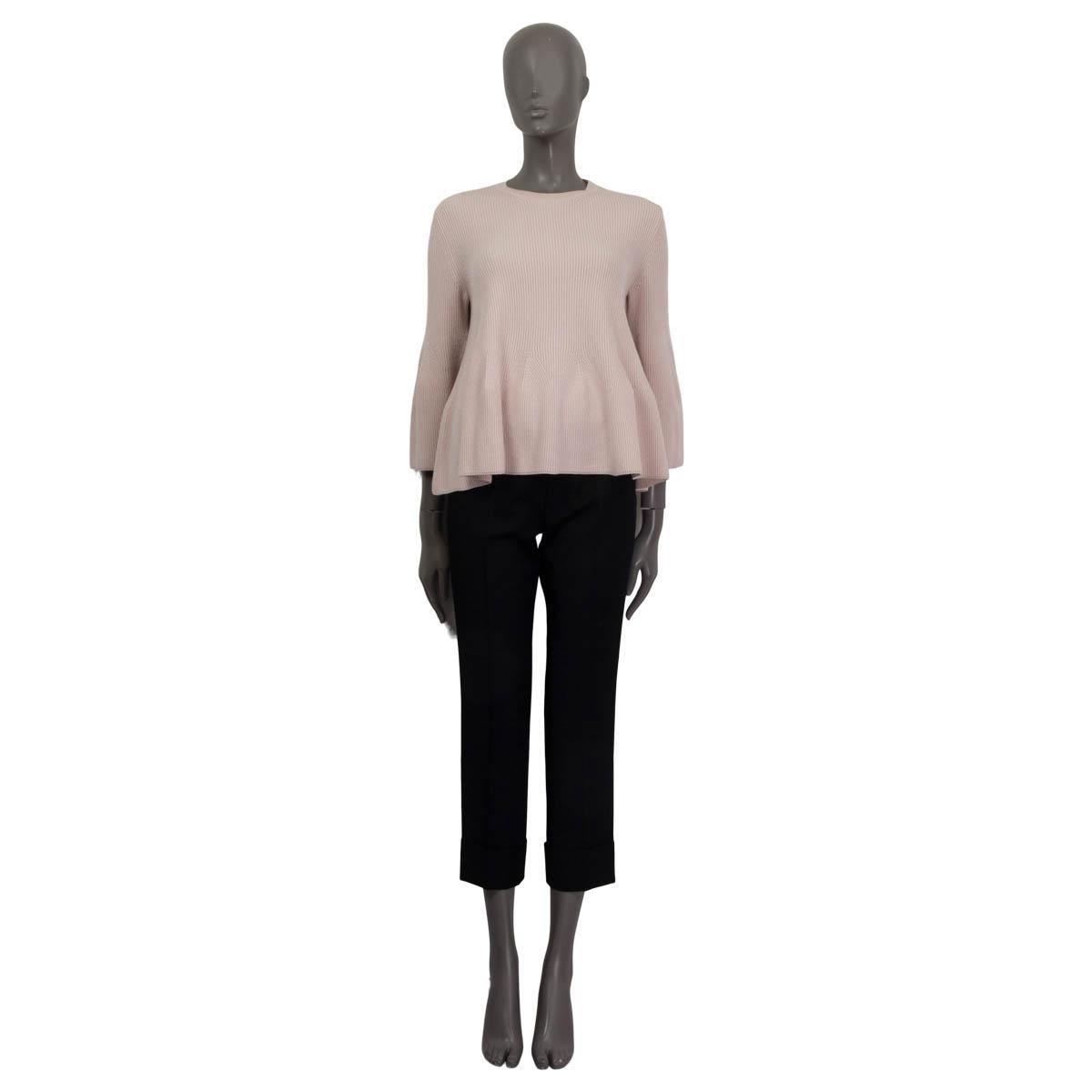 100% authentic Alexander McQueen flared knit sweater in pale rose wool (80%) and cashmere (20%). Features flared sleeves. Unlined. Has been worn and is in excellent condition.

Measurements
Tag Size	S
Size	S
Shoulder Width	39cm (15.2in)
Bust	86cm