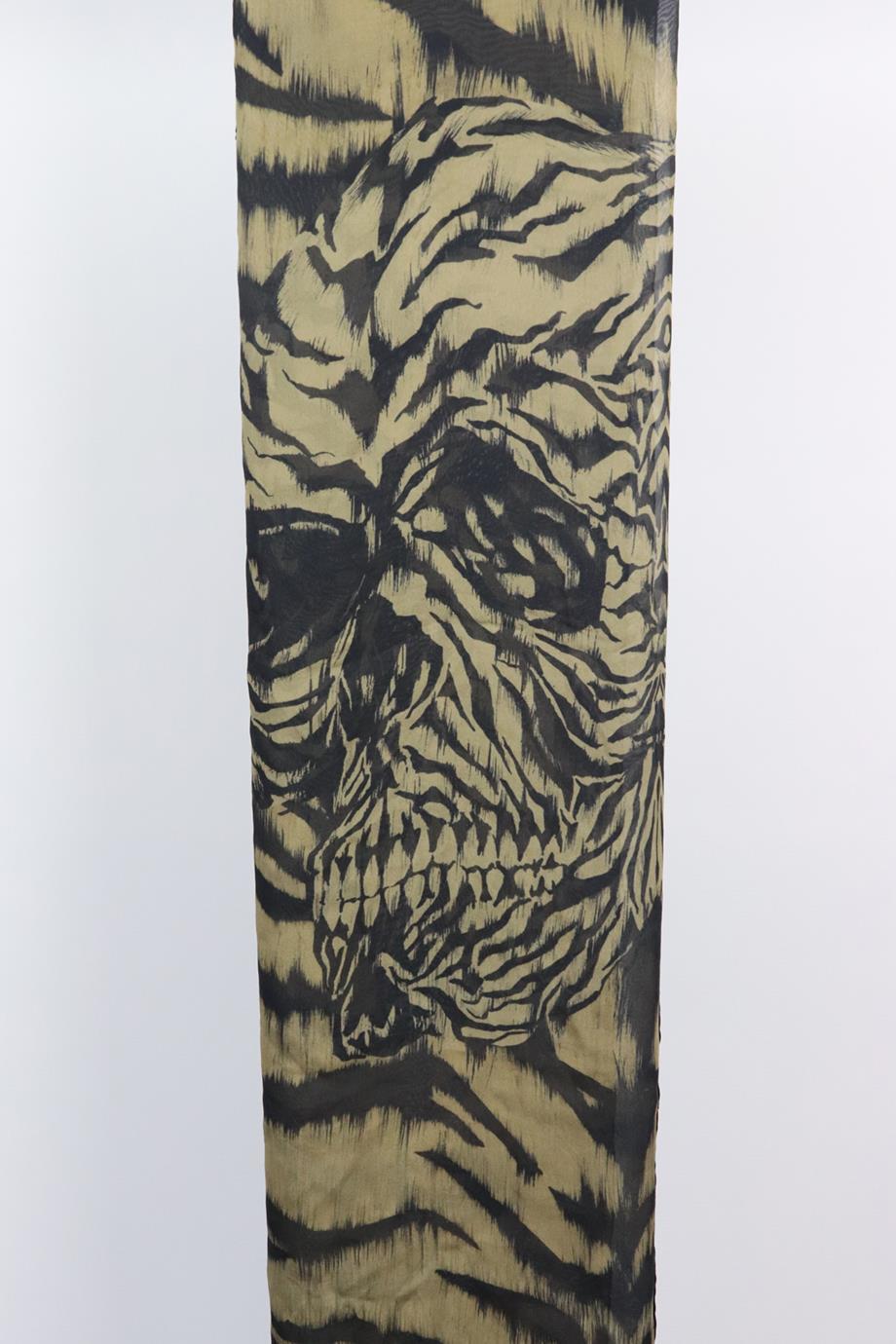 Alexander McQueen printed silk chiffon scarf. Black and khaki. 100% Silk. Does not come with dustbag or box. Length: 50 in. Width: 50 in. Very good condition - Some marks on corner; see pictures.