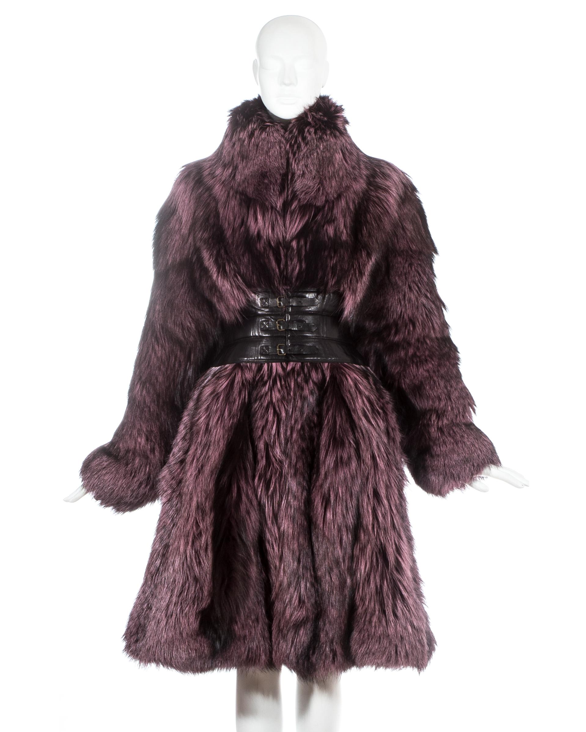 Alexander McQueen purple fox fur coat with black leather corset

Fall-Winter 2009