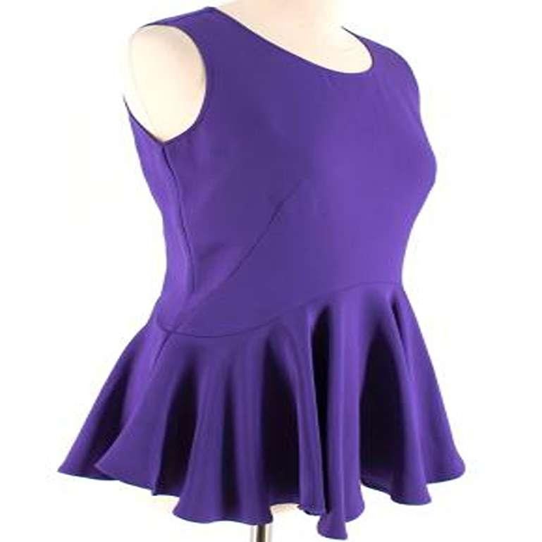Alexander McQueen - Purple Pelum Silk Top 

- round neck 
- sleeveless
- zip fastening at the side
- pleated flared hem
- darts at the chest
- mid weight

- 100% silk
- dry clean only 
- made in Italy

Please note, these items are pre-owned and may
