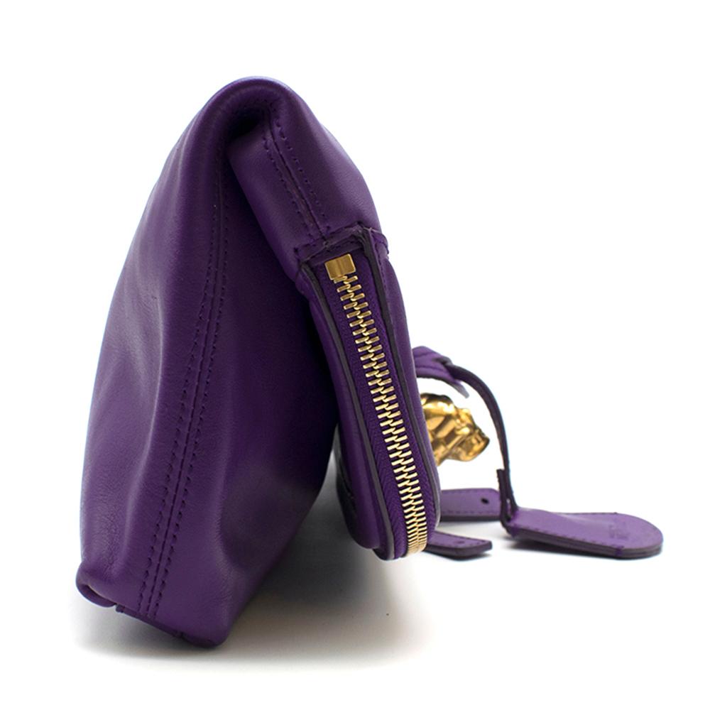 Alexander McQueen Purple Skull Padlock Fold-Over Clutch Bag 


Smooth purple grained leather clutch bag, 
Folds over, 
Features iconic Alexander McQueen skull padlock, 
Keys with leather clochette,
Top zip closure, 
Gold tone hardware, 
Features