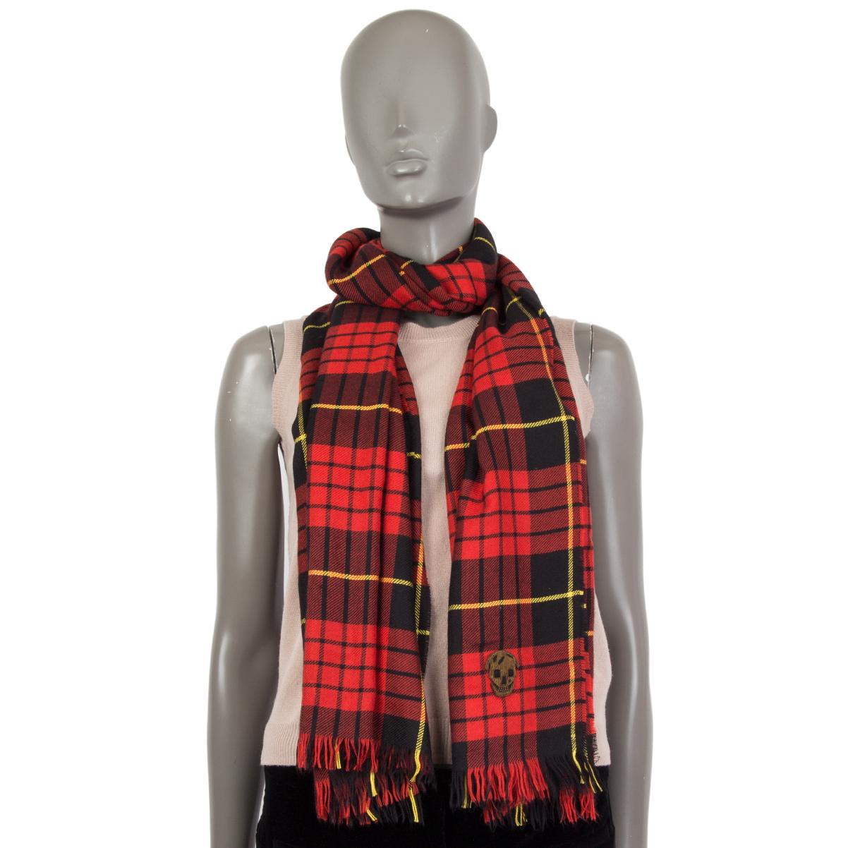 Alexander McQueen tartan shawl in red, black and yellow cashmere (100%) with embroidered skull appliquee. Has been worn and is in virtually new condition.

Width 75cm (29.3in)
Length 180cm (70.2in)