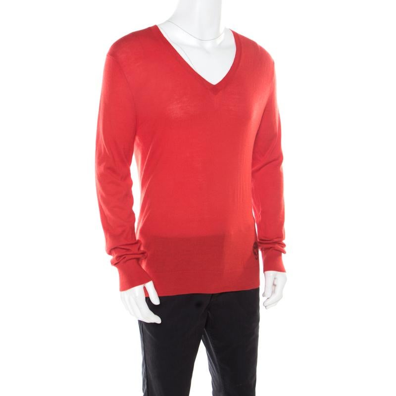 Alexander McQueen brings you this red sweater that is well-made and so easy to slip on! It is cashmere, soft to touch and warm to wear. The sweater has a V neckline, long sleeves and the signature skull detail on the front.

Includes: The Luxury