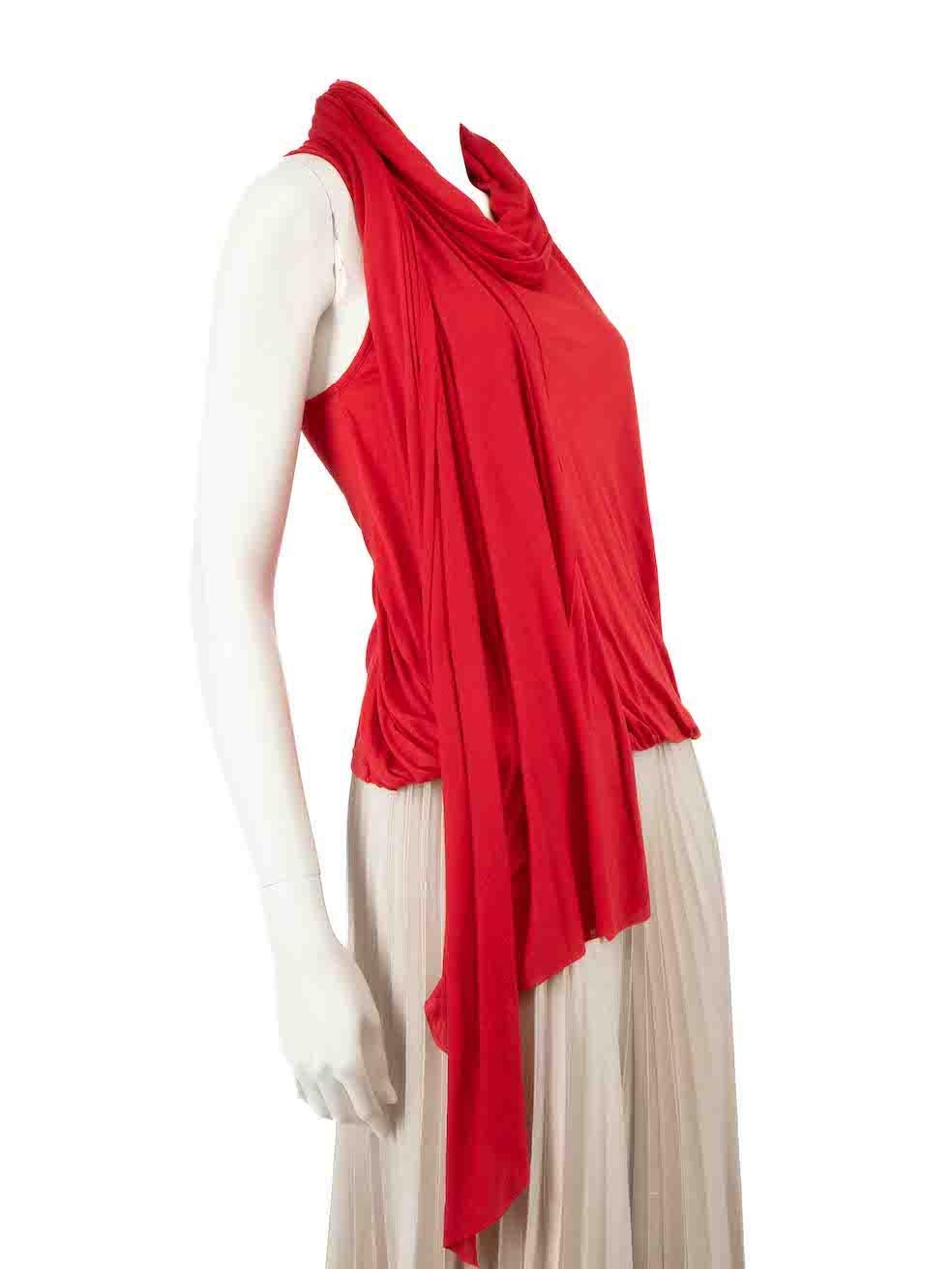 CONDITION is Good. Minor wear to top is evident. Light wear to the front and scarf detail with dark marks to the fabric on this used Alexander McQueen designer resale item.
 
Details
Red
Modal
Tank top
Draped scarf detail
Round neck
Puff hem

Made