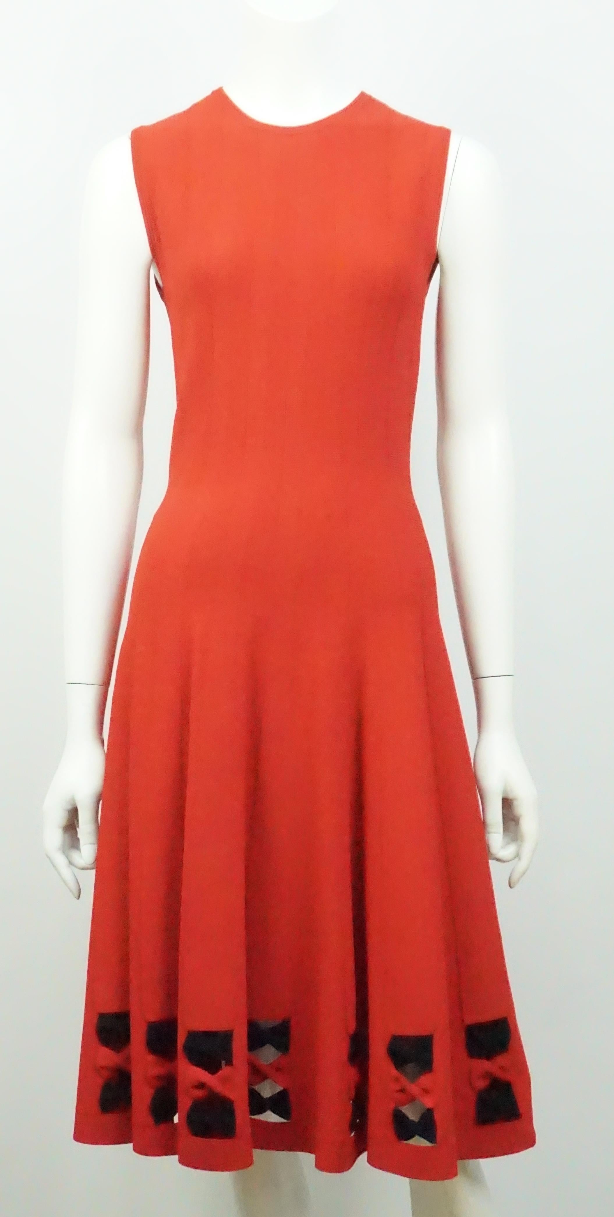 Alexander McQueen Red Knit Sleeveless Dress - Small  This very beautiful and elegant knit dress is made of a viscose/poly blend. The dress is sleeveless, has a round neckline and a single button on the back of the neck. The dress has a lot of give,