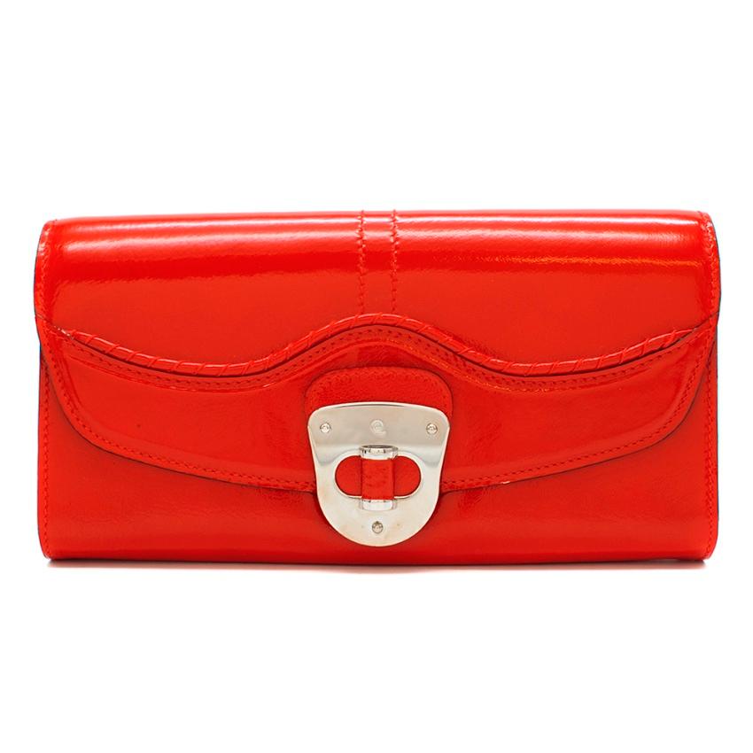 Alexander McQueen Red Patent Leather Clutch Bag/Pouch

- Back Pocket with Zip Closure 
- Front Clasp Fastening 
- Silver tone hardware 
- Interior pouch 
- Tone Stitching 
- Embossed Logo on Front 
- Original box and dust bag included 

Made in